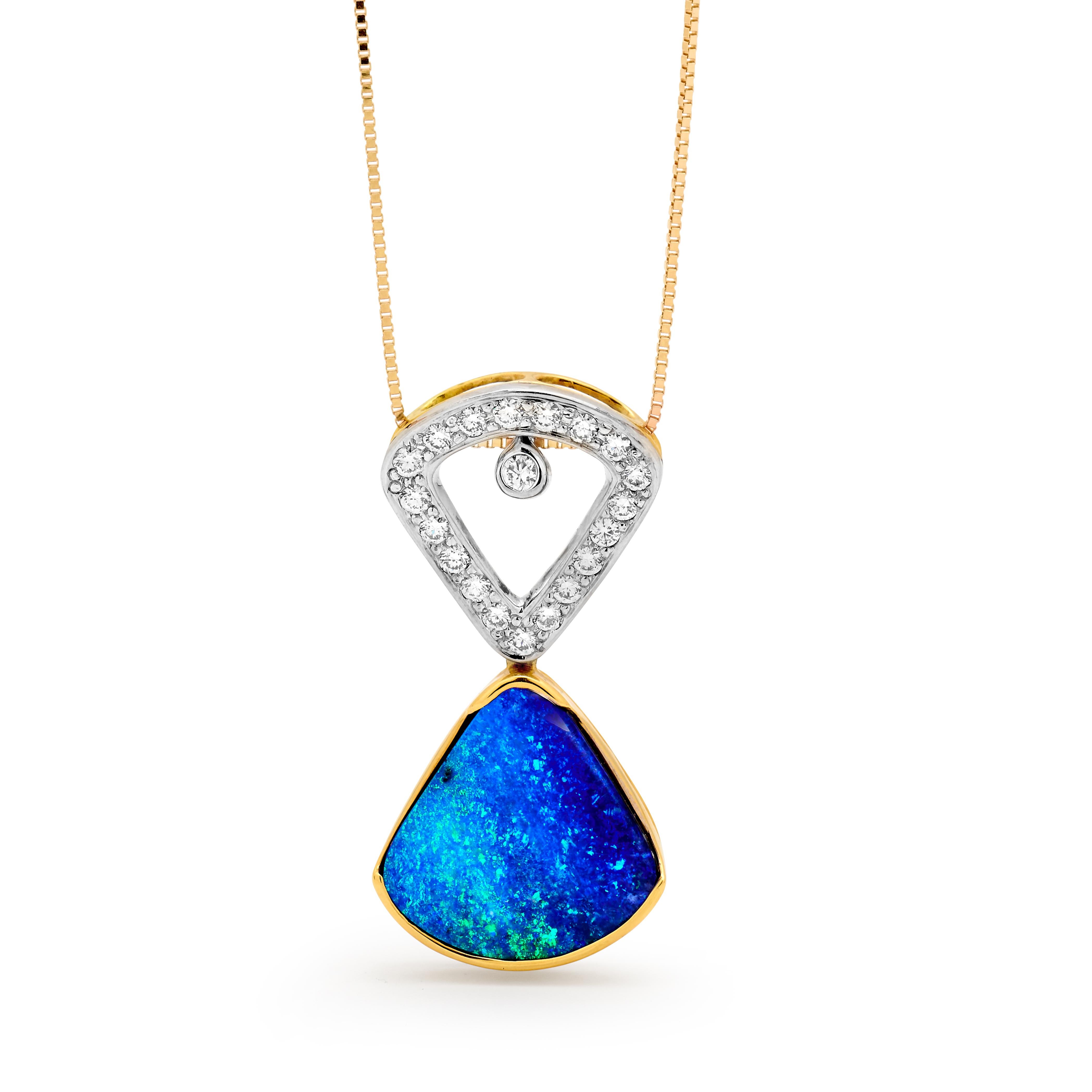 A sea voyage inspired “When the Sea Meets the Sky” opal pendant. Set in 18K white and yellow gold, the vivid Winton boulder opal (12.22ct) lies under a shimmering canopy of stars. Wish upon a star and make your opal dreams come true. A perfect gift