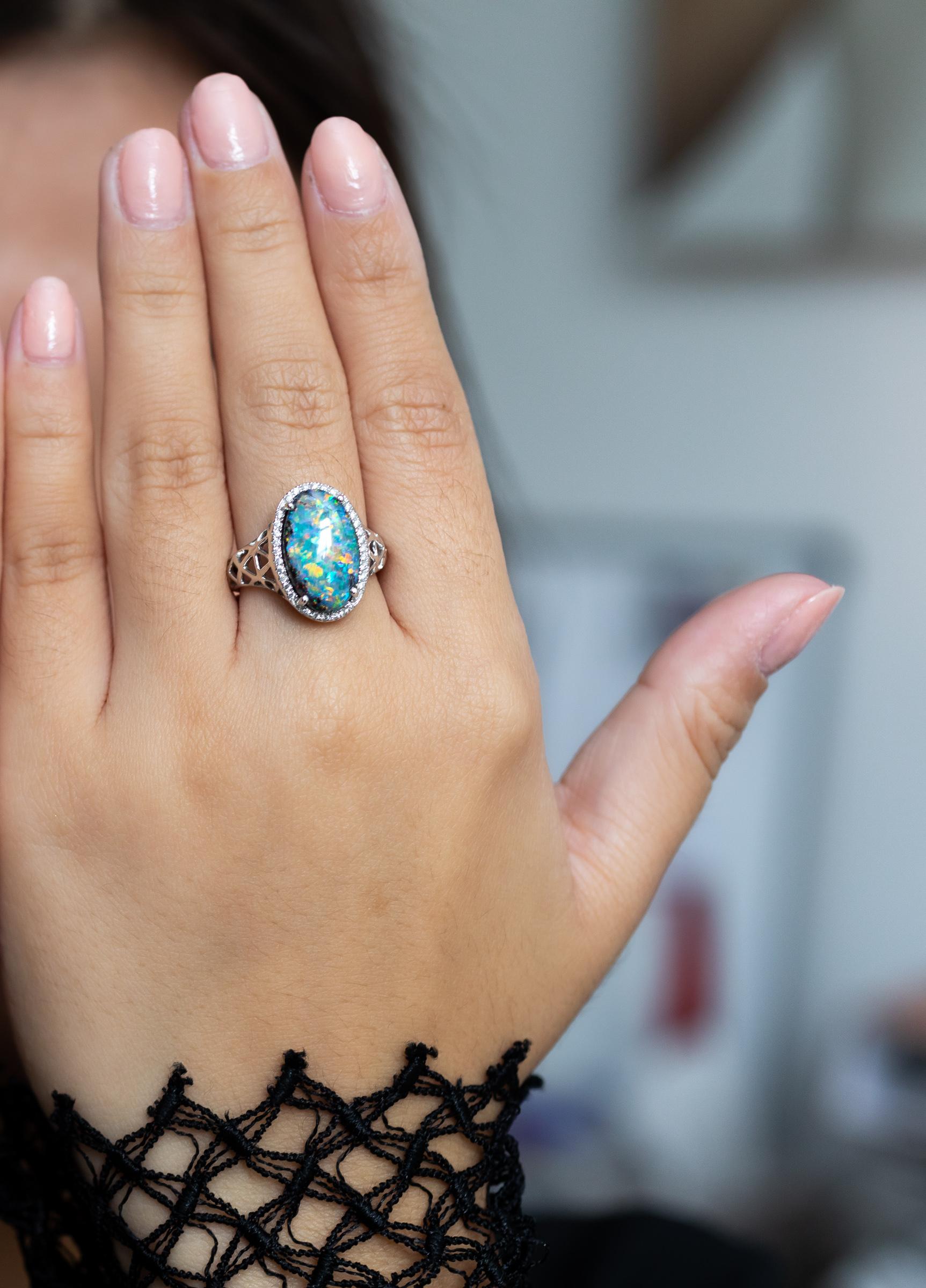 A multi-coloured Australian natural opal (4.56ct) is the heart of the “Juliette” opal ring. The intricate 18K white gold setting and a sparkle of 32 diamonds add another dimension to the opal sourced from our very own mines in Jundah-Opalville. One