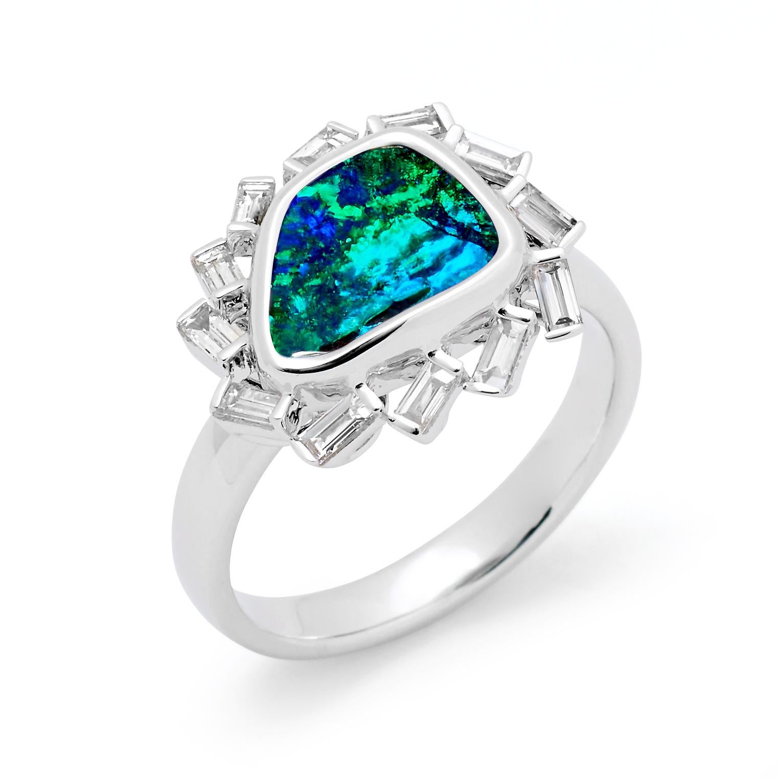 “Bright Star” opal ring was inspired by the beauty of the desert at night. A breathtaking Winton boulder opal (3.10ct) set in pure 18K white gold is circled by a constellation of sparkling diamonds. Vibrant, elegant and as mysterious as the night