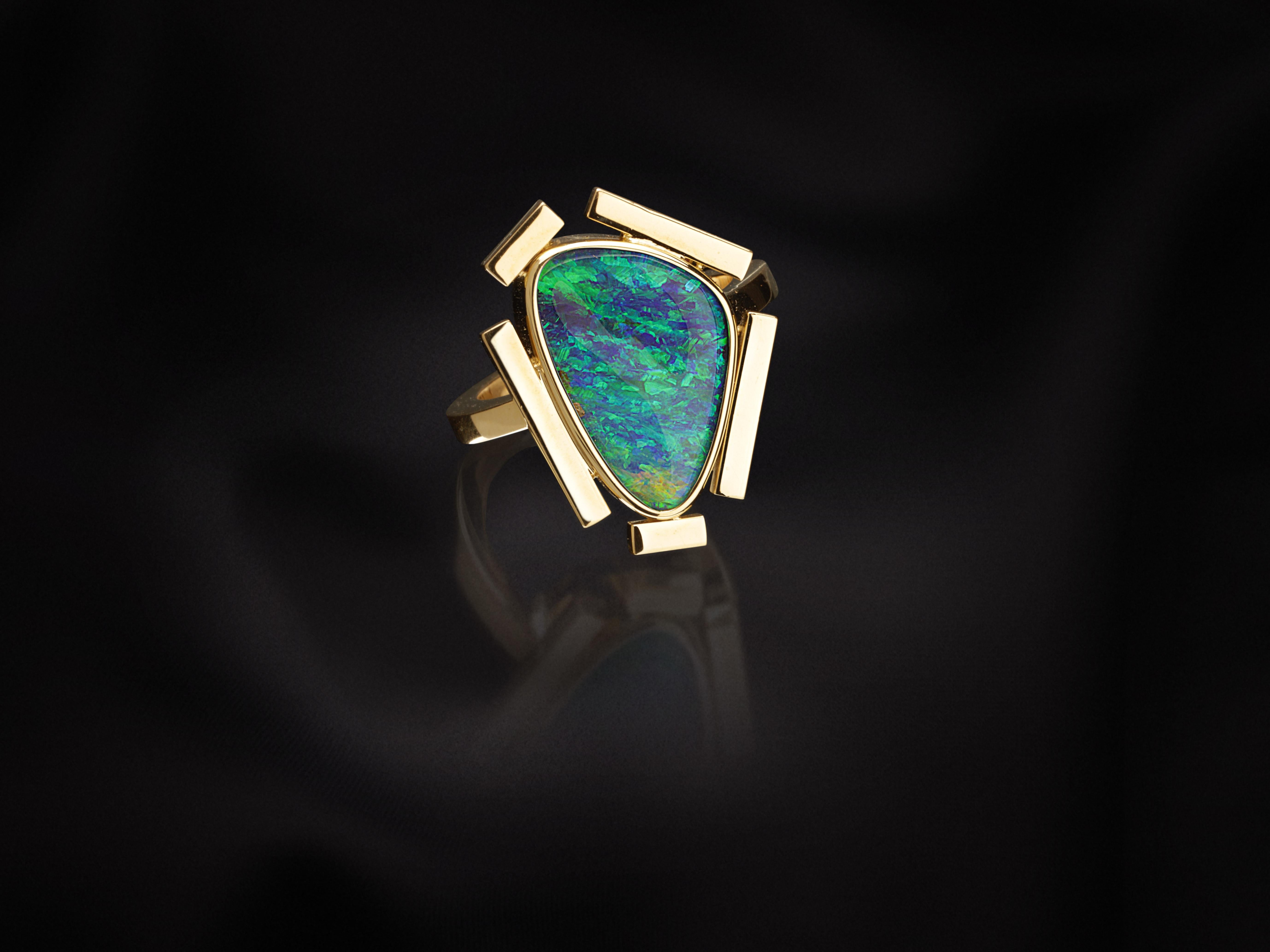 This ring is handmade in 18k yellow gold with a 5,01ct top-quality boulder Australian opal.
It has been designed and handmade in Barcelona.