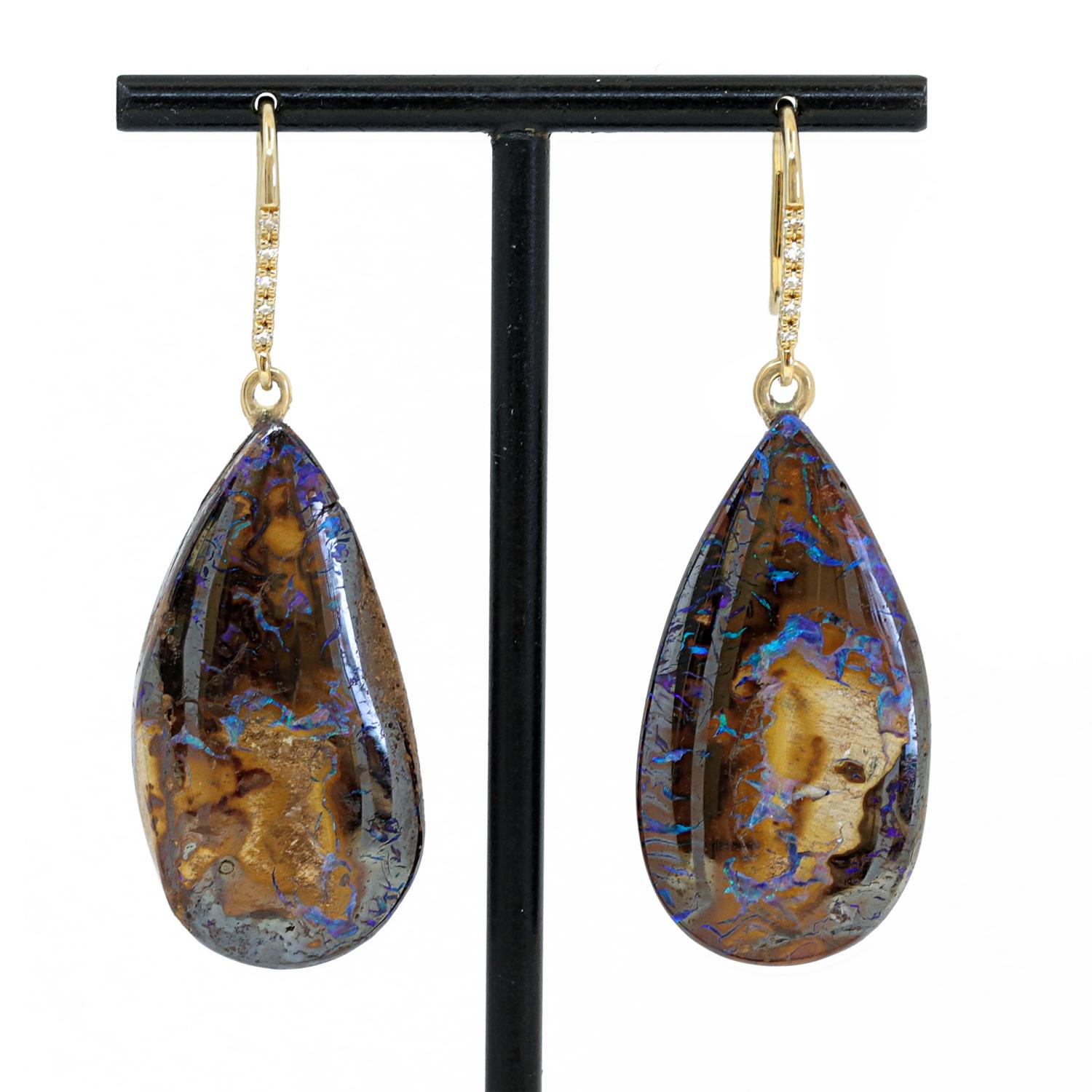 One of a Kind Drop Earrings by jewelry designer Just Jules featuring a spectacular matched pair of natural solid Australian boulder opal drops, each flickering with ethereal and electrifying blue and green fire throughout the opals' signature