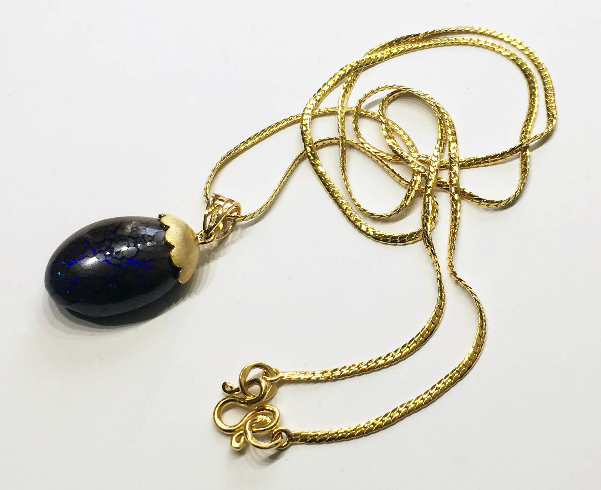 Artist Australian Boulder Opal Pendant Hanging from a 23kt Gold Necklace