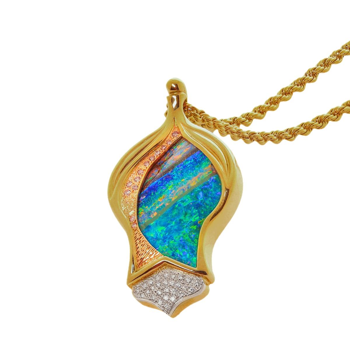 What a stunning pendant, this piece represents Australia’s magnificent gemstones like no other. With its truly amazing Black Boulder Opal of over 50ct from the Queensland outback, to its Pink and Brilliant White Diamonds from the Argyle diamond