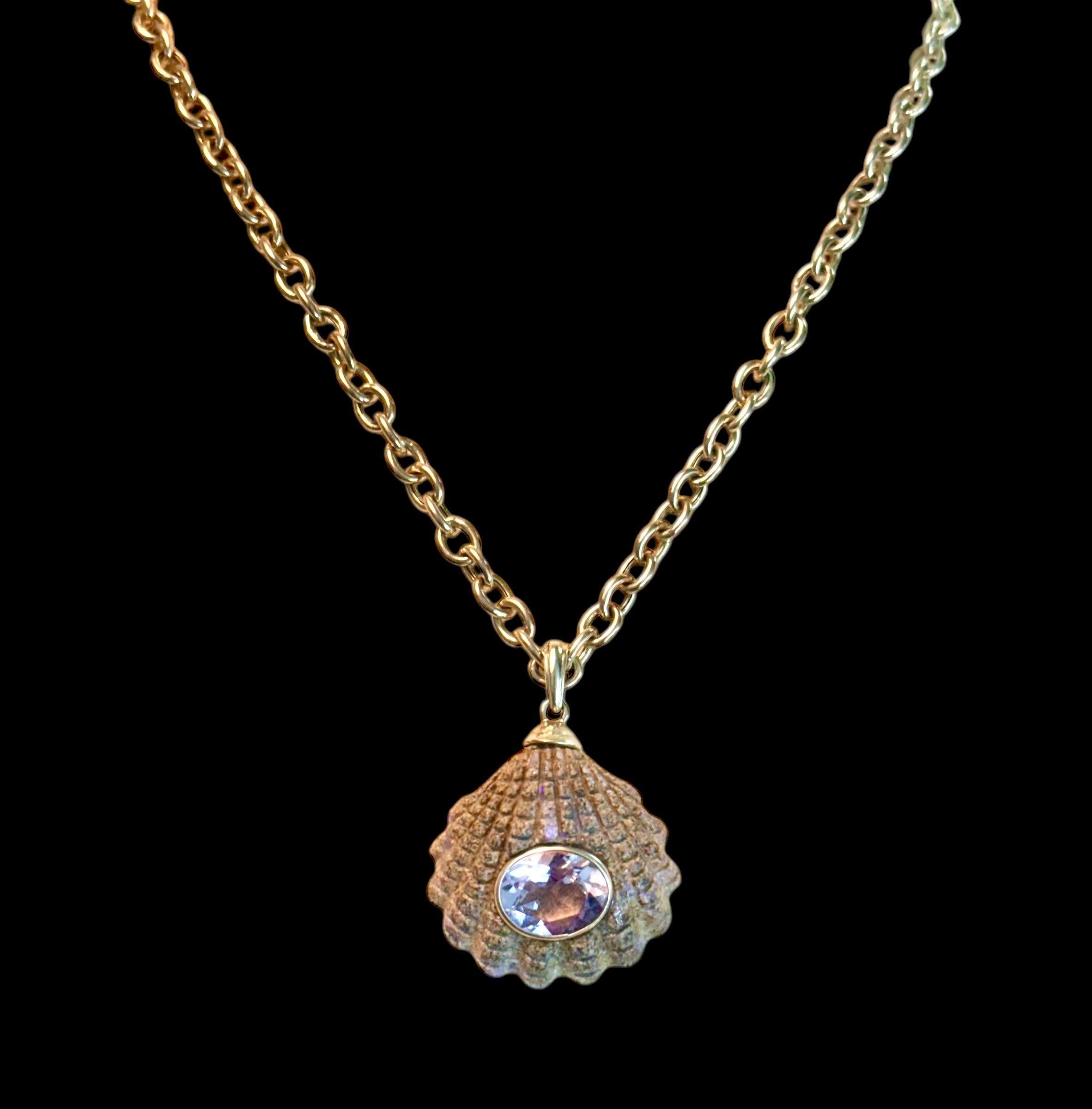 Australian Boulder Opal Shell Pendant

Australian Opal, Amethyst & 14k Gold

This very special opal hails from Queensland, Australia. Mined from a lovely family opal mine.

The pendant measures 1” in diameter, exclusive of the bail. The carved