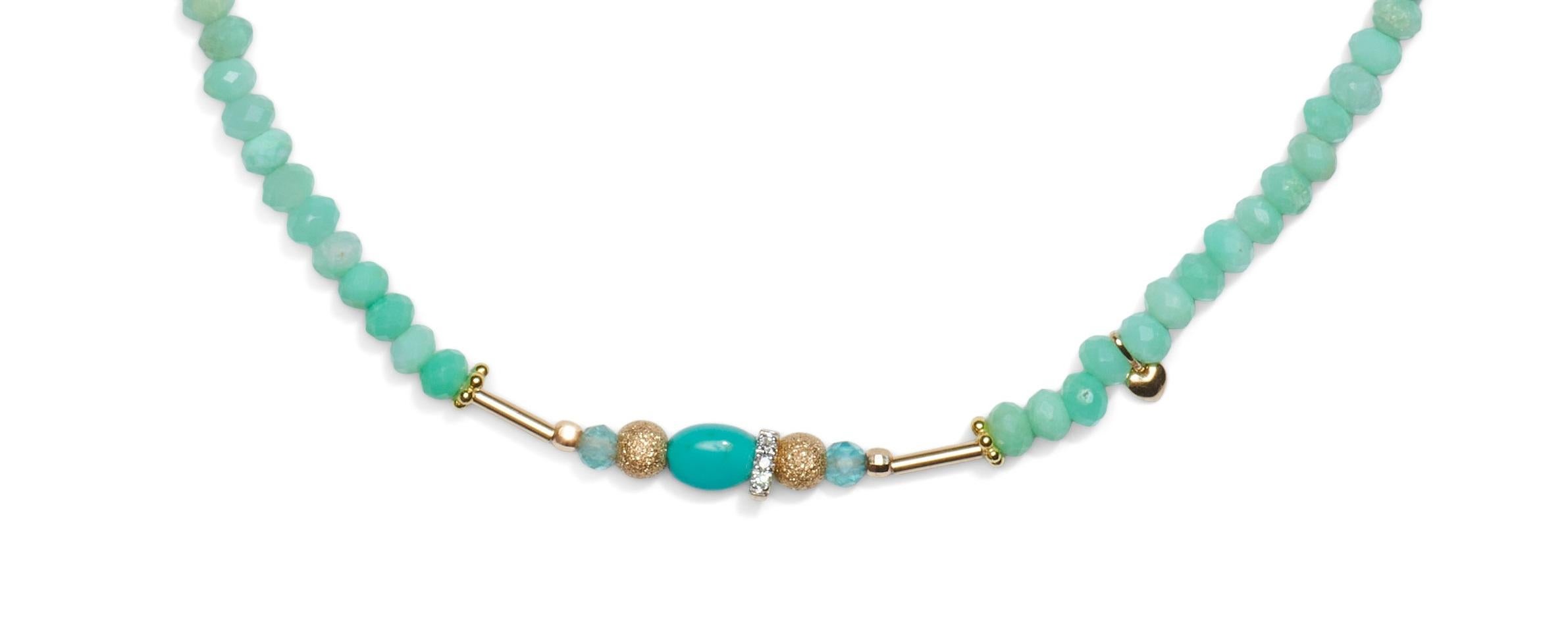 Drench youself with playful colors! Hand strung sophisticated precious bohemian gemstone necklace in a beautifull mint green color, enriched with playfull details such as;

• Sparkling white natural diamonds (3 diamonds)
• Sparkling hand carved