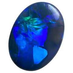 Australian Dark Opal 9.70 Ct Bicolor Opalescence Oval Cabochon Deep Blue Stone