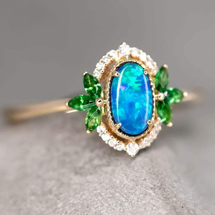 Australian Doublet Opal Diamond Tsavorite Engagement Ring 14K Yellow Gold.


Free Domestic USPS First Class Shipping! Free Gift Bag or Box with every order!

Opal—the queen of gemstones, is one of the most beautiful gemstones in the world. Every