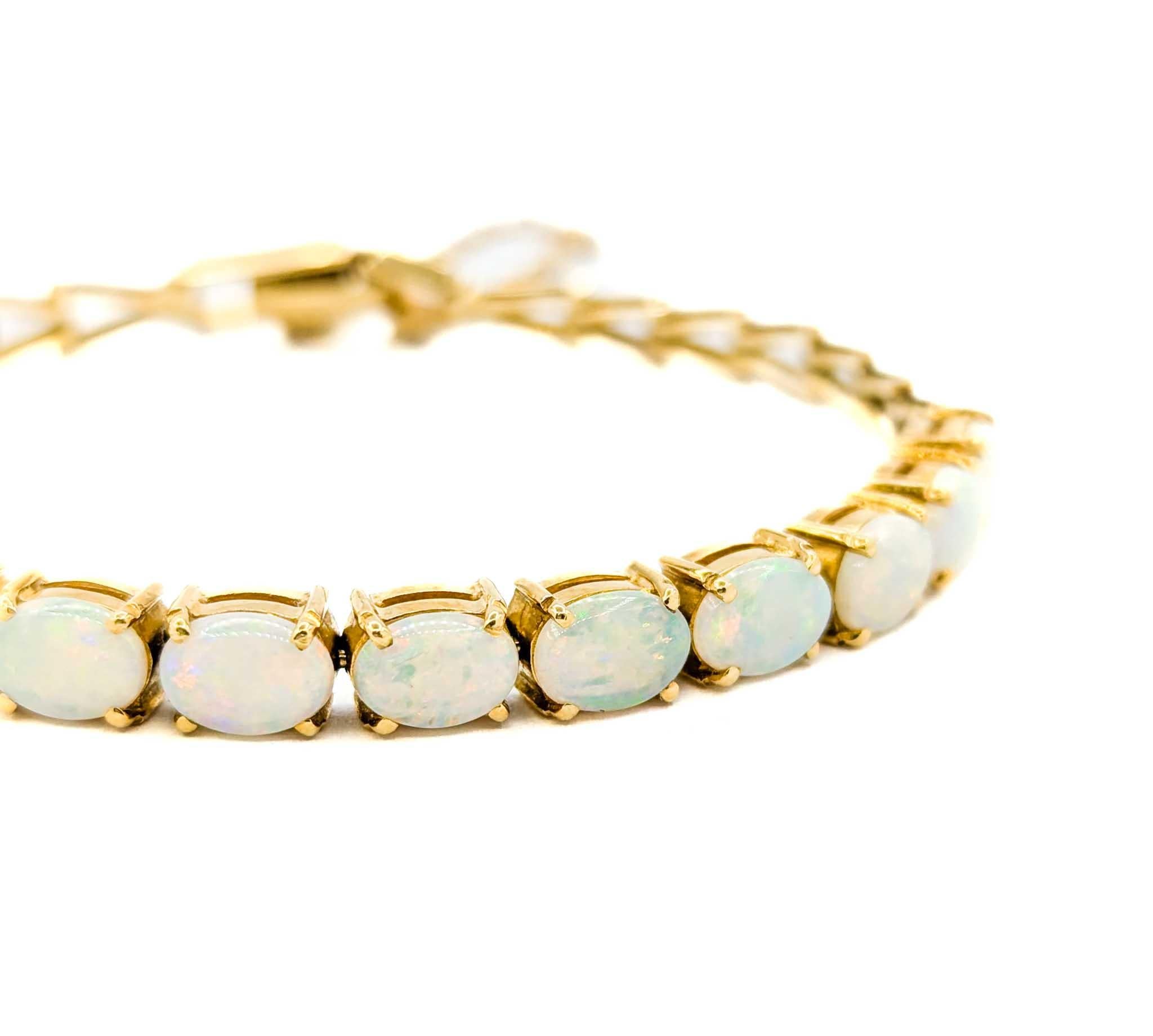 Australisches Armband aus 18 Karat Gold mit geflammtem Opal-Cabochon 5