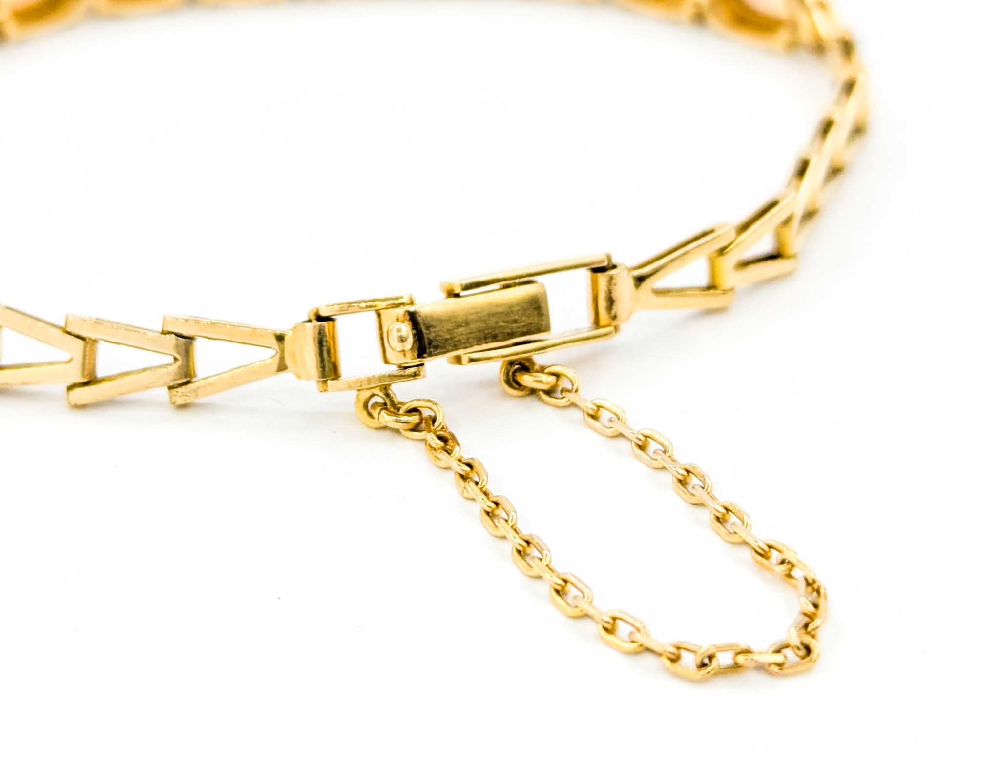 Australisches Armband aus 18 Karat Gold mit geflammtem Opal-Cabochon (Ovalschliff)