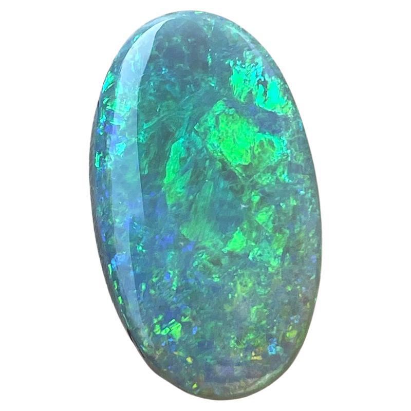 Australian Green Opal 12.10 Ct Oval Cabochon Natural Gemstone Broadflash Pattern For Sale