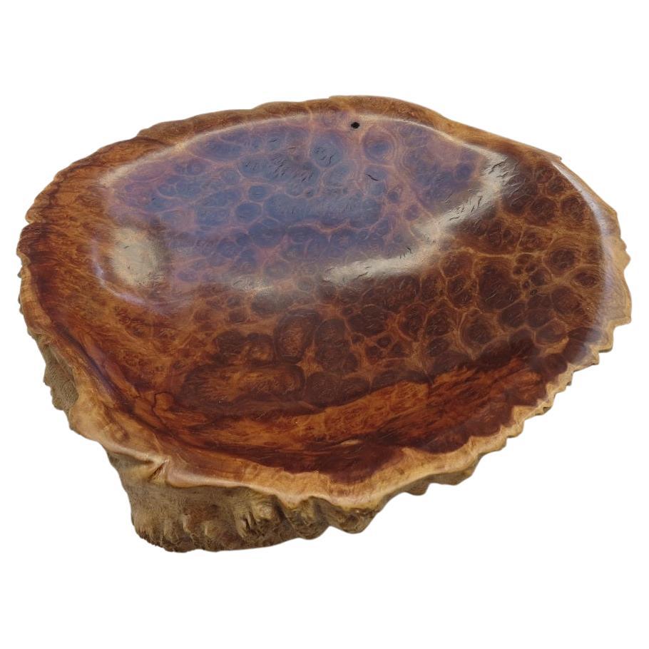 Wonderful hand produced bowl, made from solid Mallee wood. Originates from Australia. Very nice smooth finished bowl, contrasting to the textured exterior. Signed Bailey to the underside.

ST1303.