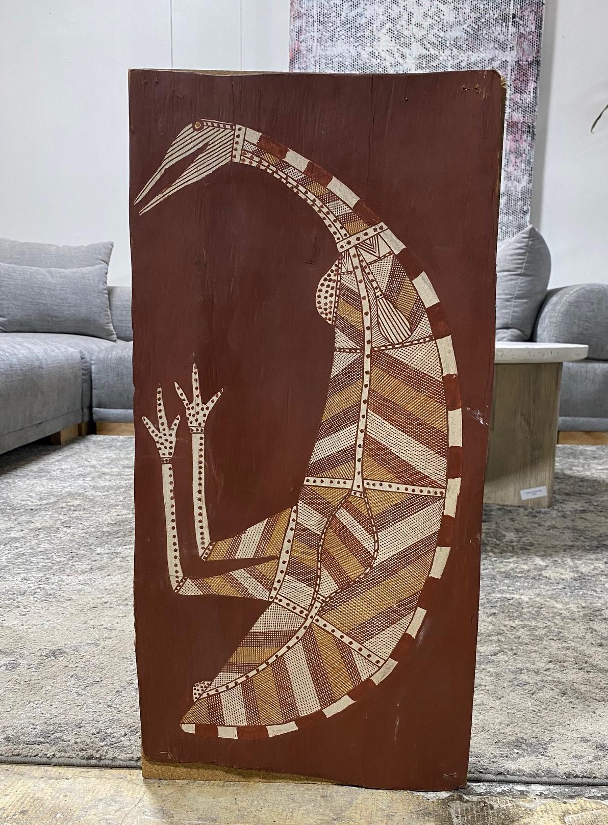 A wonderful, unique, and very engaging original indigenous painting by Australian Aboriginal artist Thompson Yulidjirri, (C1930-2009). The painting is made with natural earth pigments on eucalyptus bark and mounted to a backing for display.  It was