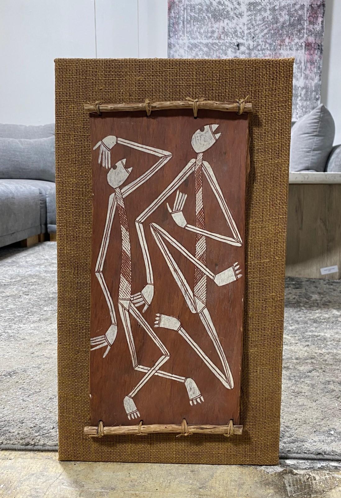 A wonderful, unique, and very engaging original indigenous painting by Australian Aboriginal artist Thompson Yulidjirri, (C1930-2009) featuring two Mimi figures. The painting is made with natural earth pigments on eucalyptus bark and affixed to a