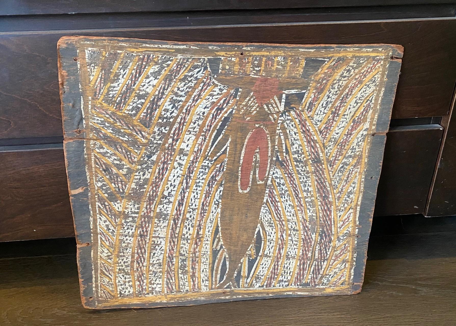 A wonderful, unique, and very engaging original antique/vintage indigenous Australian Aboriginal dreaming painting featuring a rainbow serpent- a prominent figure in Aboriginal mythology/history.  Revered by many Aboriginal tribes, this mythical