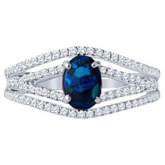 Australischer Australian Lightning Ridge Ring aus 18 Karat Weißgold mit ovalem blauem Opal und Diamant