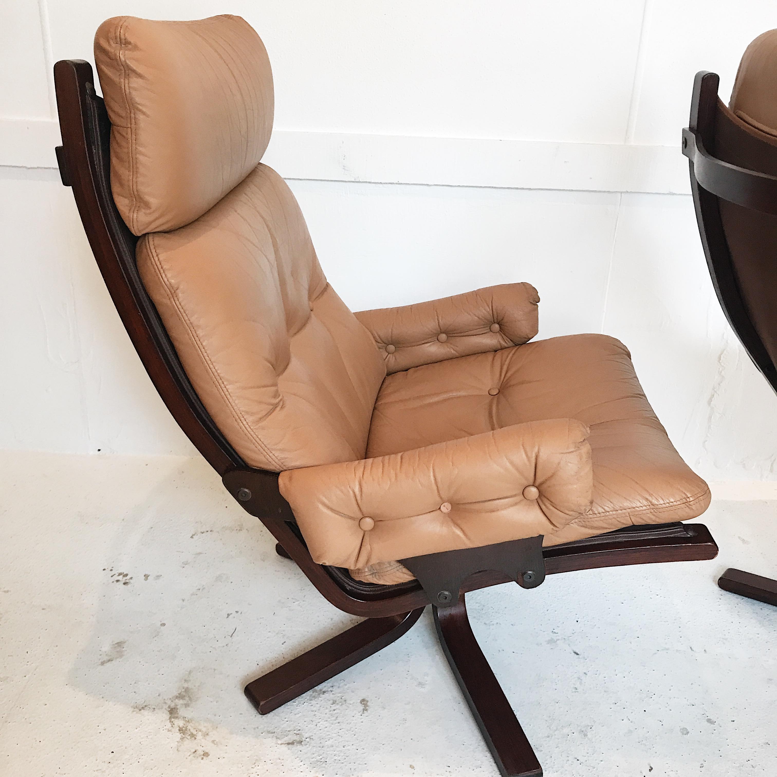 Naturally stylish pair of Mid-Century Modern armchairs for Australian furniture design company, Module.

Top drawer design by Gerald Easden, this pair are as easy on the eye as they are comfortable. Natural nude leather, with wood frames