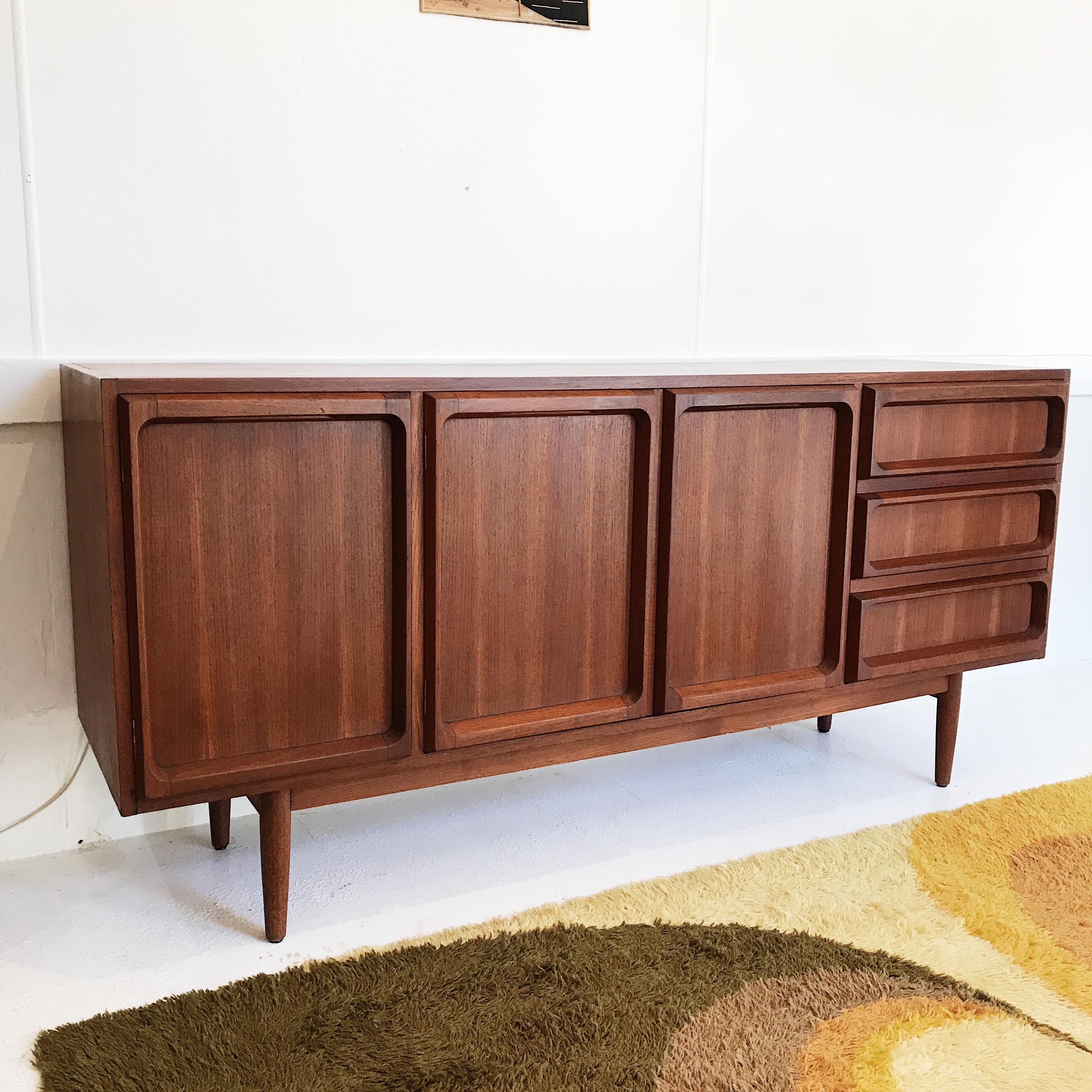Heirloom example of Chiswell furniture's iconic, “Deep Profile” range of the late 1960s. This is one of the highly sought-after 3-door, 3-drawer variations, renowned since it's introduction in 1969.

Fabulously bold and solid teak, modernist lines