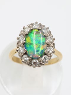 Australian Natural Black Opal & Diamond Cluster Ring set in 18k Yellow Gold