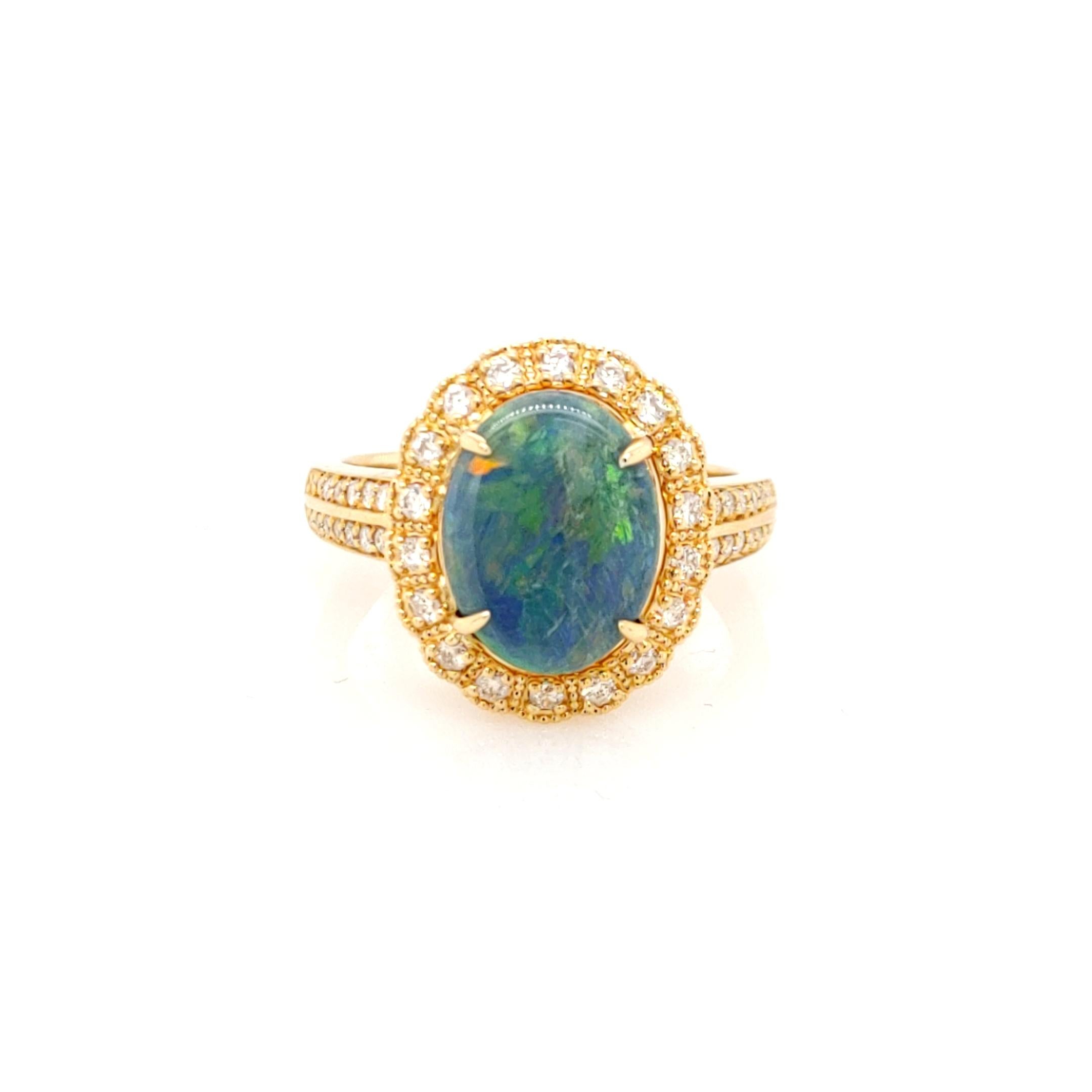 Australian Opal Cocktail Ring 

Lighting Ridge Solid Opal 2.40 Cts surrounded by white diamonds and set in 18K Yellow Gold 

White Diamonds,  0.44 Cts 
18K Yellow Gold, 6.83 Grams