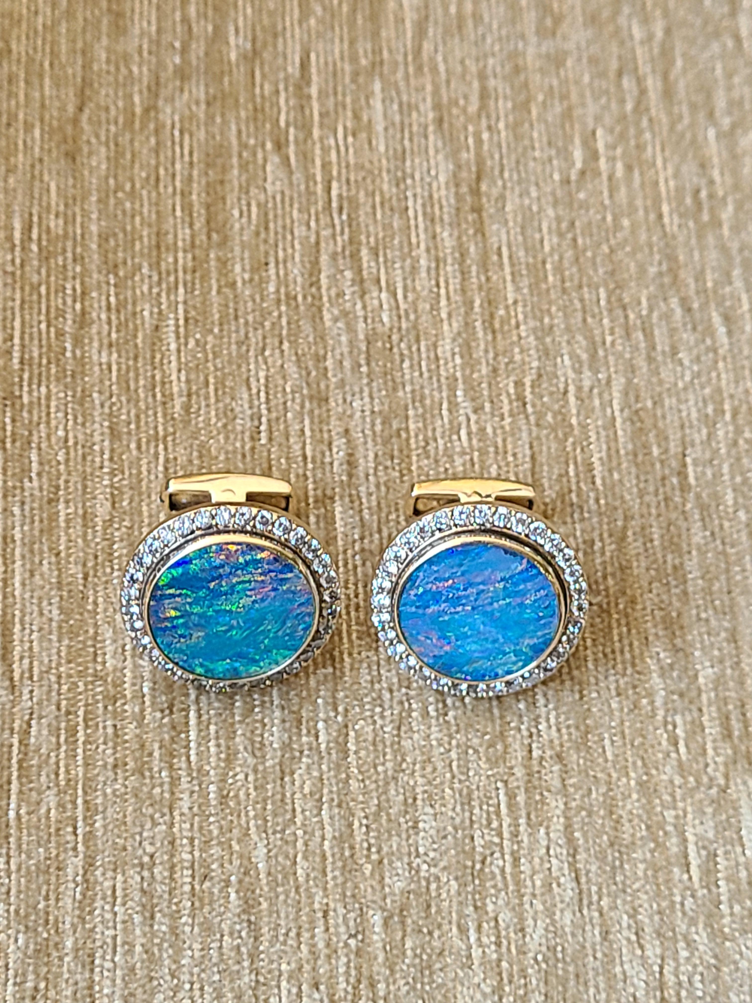 A pair of gorgeous and modern Australian doublet opal cufflinks with diamonds in 14k yellow gold. The opal weight is 8.76 carats and diamond weight is  1.2 carats. The net gold weight of cufflinks is 10.819 grams and dimensions in cm 2 x 2 x 2.1