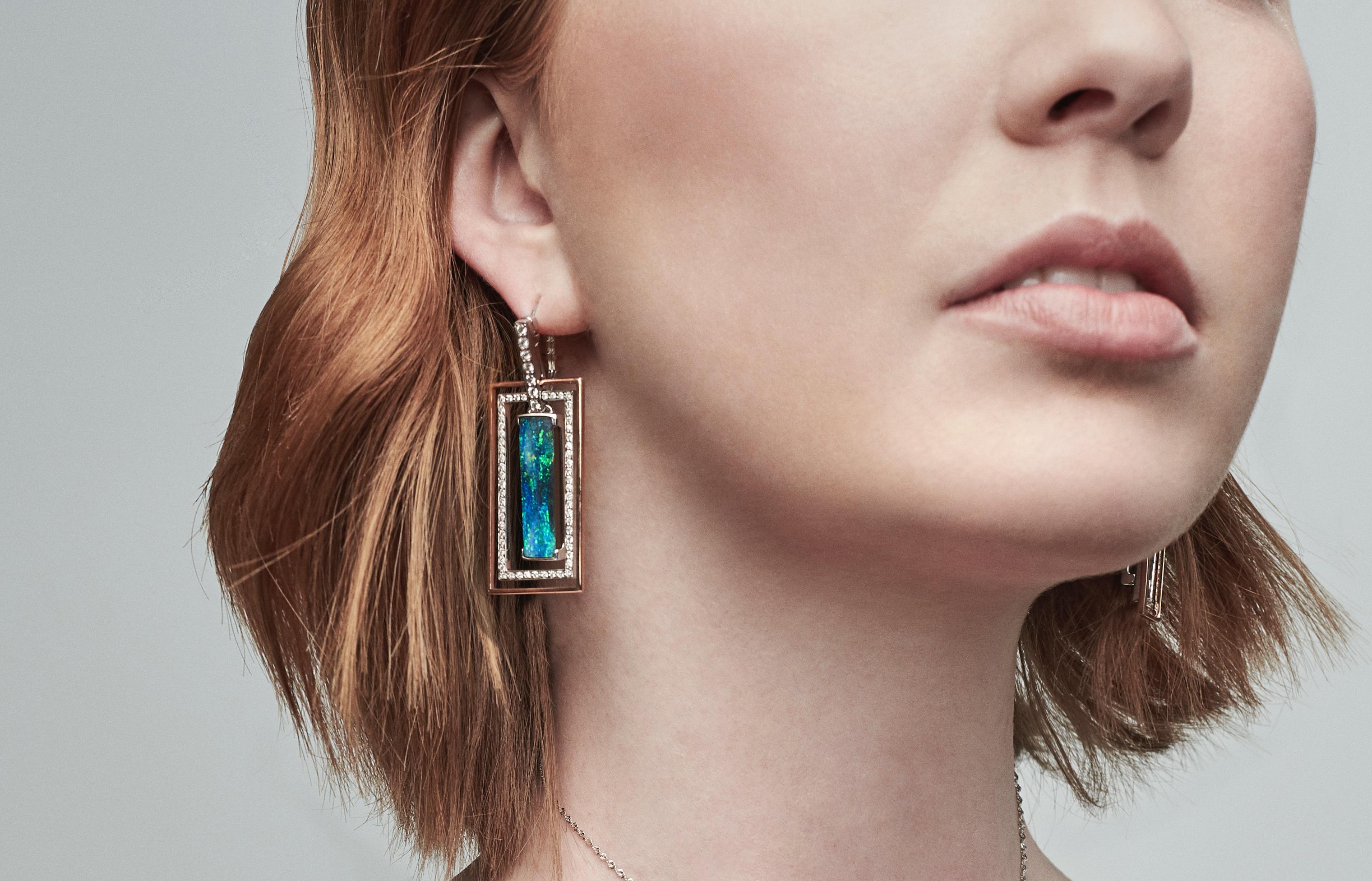 “E=mc2” opal earrings were inspired by the shifting paradigms of modern physics. Striking boulder opals (18.73ct) from Winton are complemented by their geometric 18K white and rose gold setting. What sets this striking pair apart is the capacity to