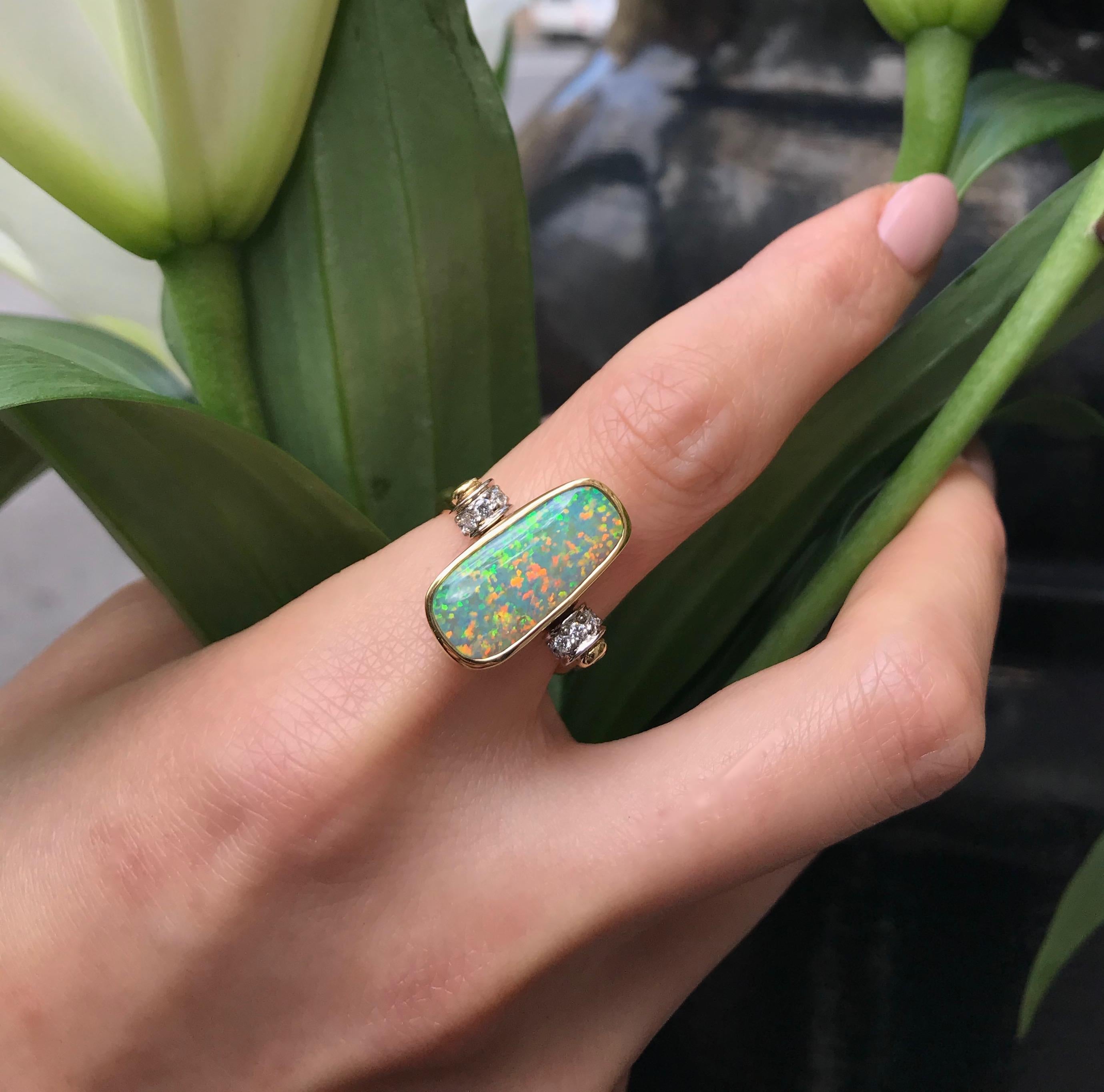 Versatile and very clever “Così Fan Tutte” is both a ring and a pendant. A flawless boulder-pipe opal (6.6ct) from our own mines in Queensland is shown off to advantage by its unusual 18K yellow gold setting. A flick of the two white gold