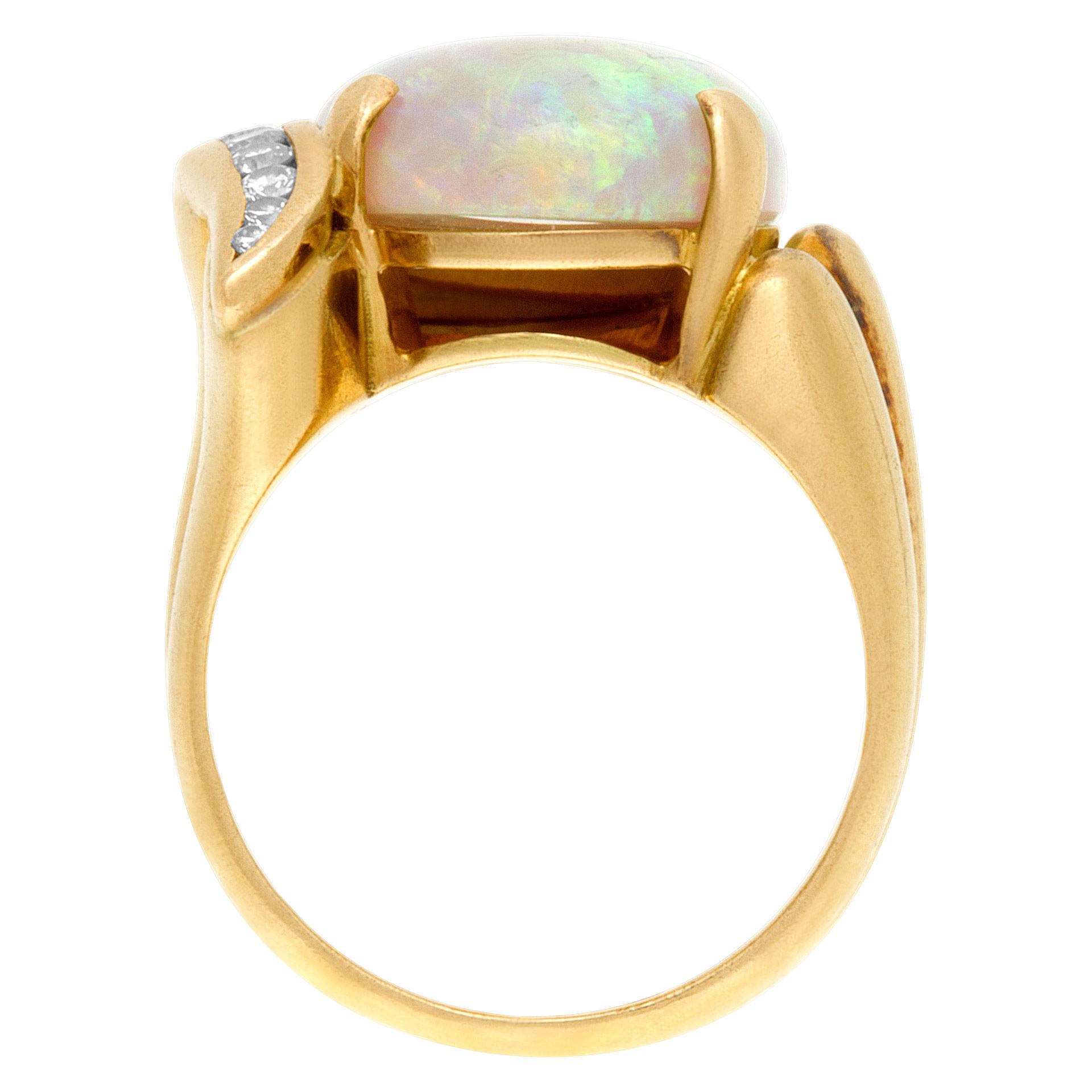 diamond engagement ring with opal accents