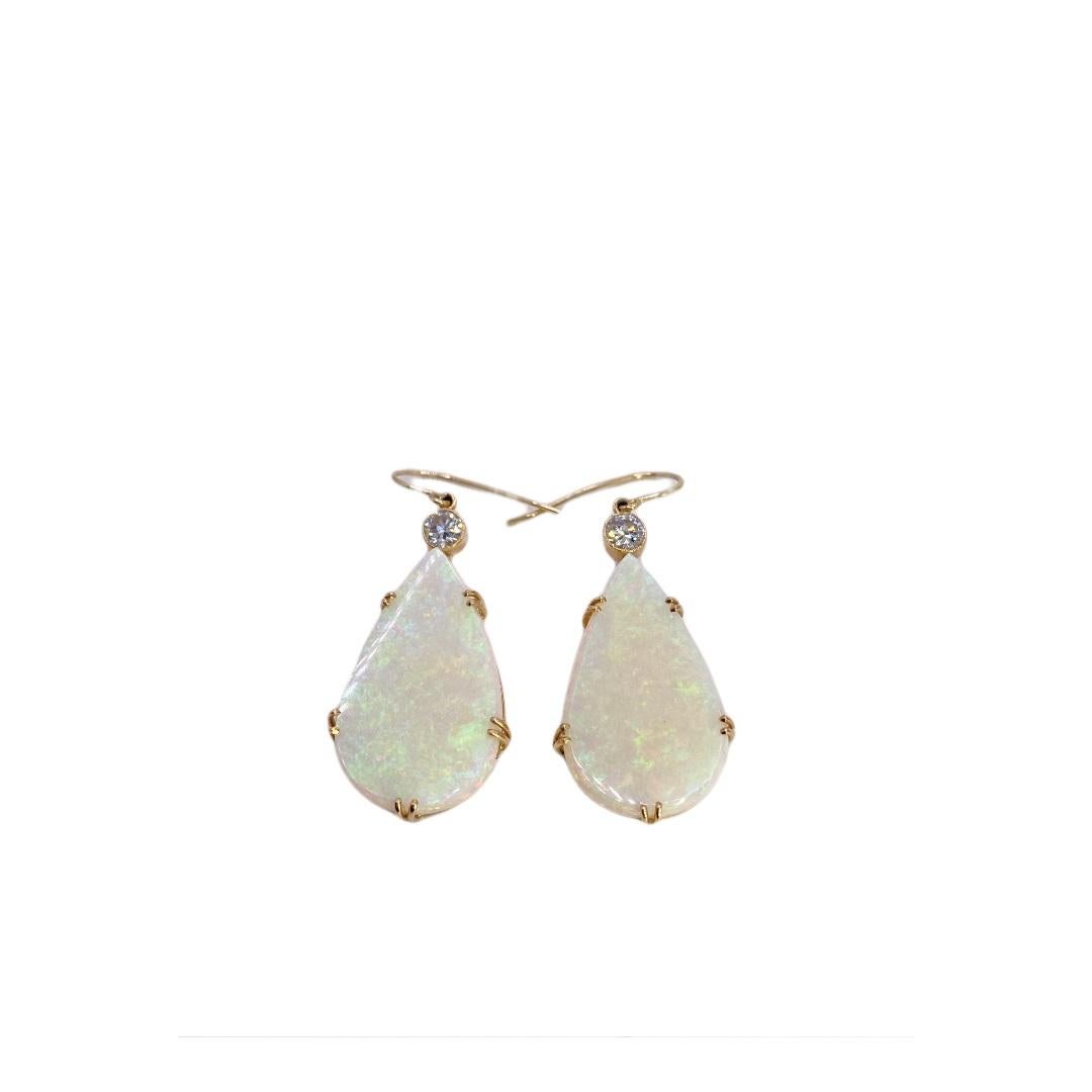 Estate 24.35 carat total weight Australian opal and 2=0.45 carat total weight  round brilliant cut diamond earrings set in 14k yellow gold. Drop length 1.5