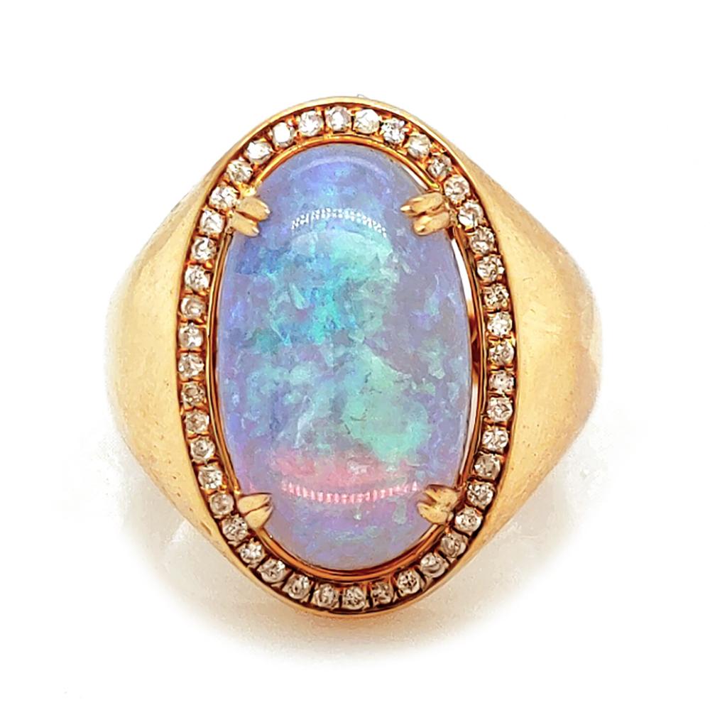 Australian Solid Opal Signet Ring, 8.40 Cts surrounded by white diamonds and set in 18K yellow gold 

White Diamond Ring, 0.22 Cts 
18K Yellow Gold, 11.30 Grams

*Free Shipping 