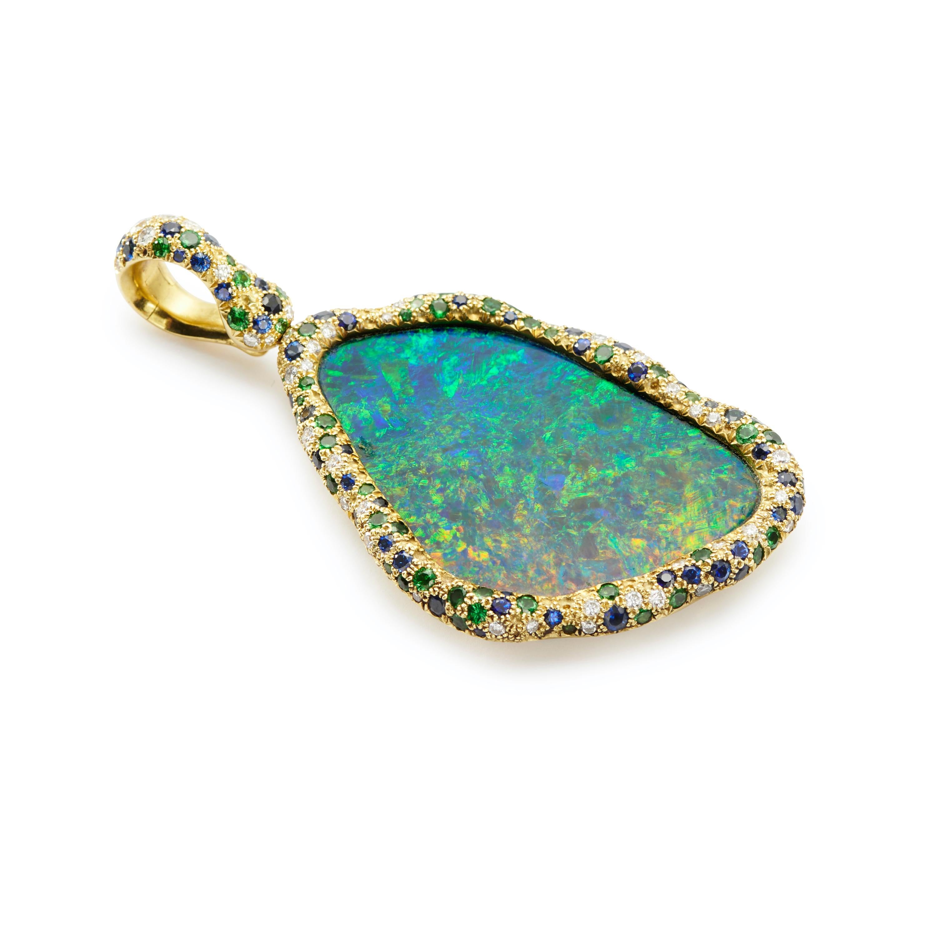 This pendant, inspired by the beauty, emotion and color influences of post-Impressionist painter Van Gogh, is one of Susan Lister Locke's most magnificent and exquisitely-designed creations.

A stunning slice of Australian Opal mesmerizes with