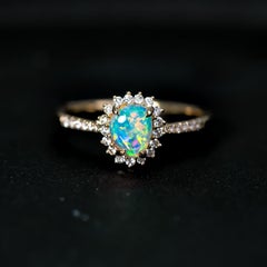 Australian Opal & Diamond Halo Engagement Ring in 14K Yellow Gold