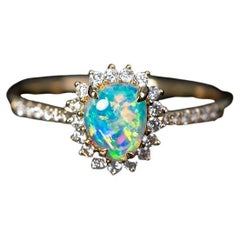 Australian Opal & Diamond Halo Engagement Ring in 14K Yellow Gold