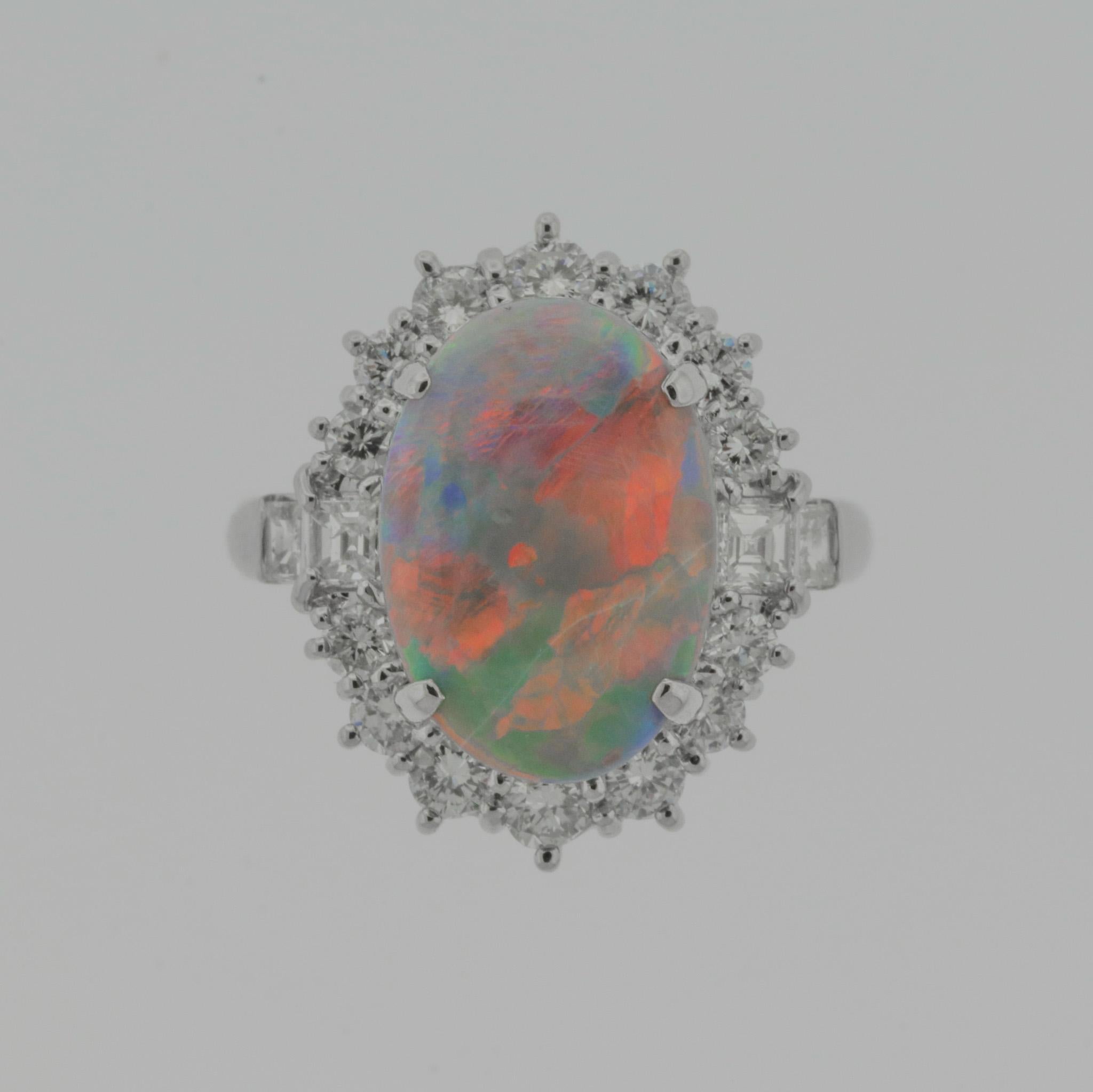 A deal of a natural 3.96 carat Australian opal, which some would consider as black, offered at a great deal! It has lovely play-of-color as mainly flashes of red and orange, as well as blues and greens can be seen across the stone. It is
