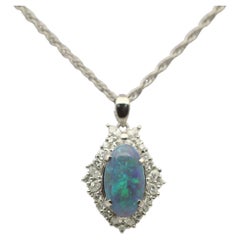 Ciondolo in platino con diamante e opale australiano