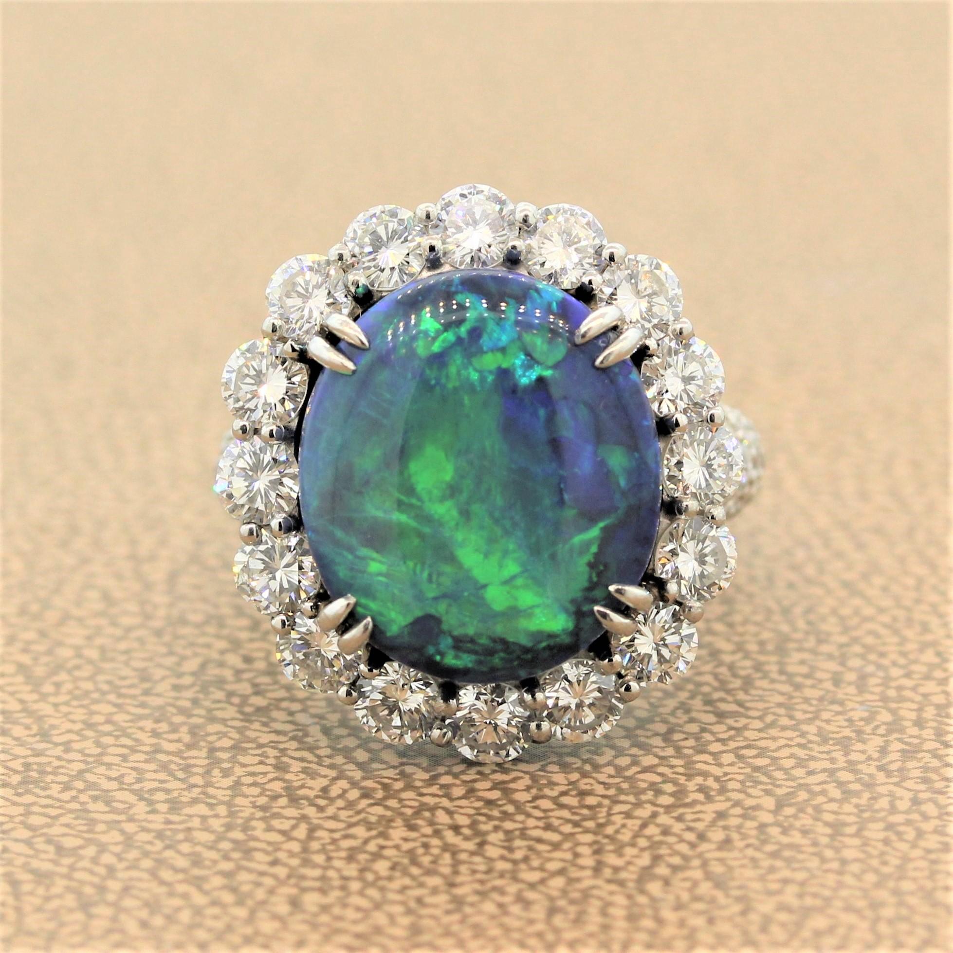 A remarkable ring featuring a 10.47 carat Australian opal with gorgeous play of color. Shimmering hues of blues and greens flash as the light rolls across the gemstone. To keep up with the lavish opal are 4.08 carats of round brilliant cut diamonds