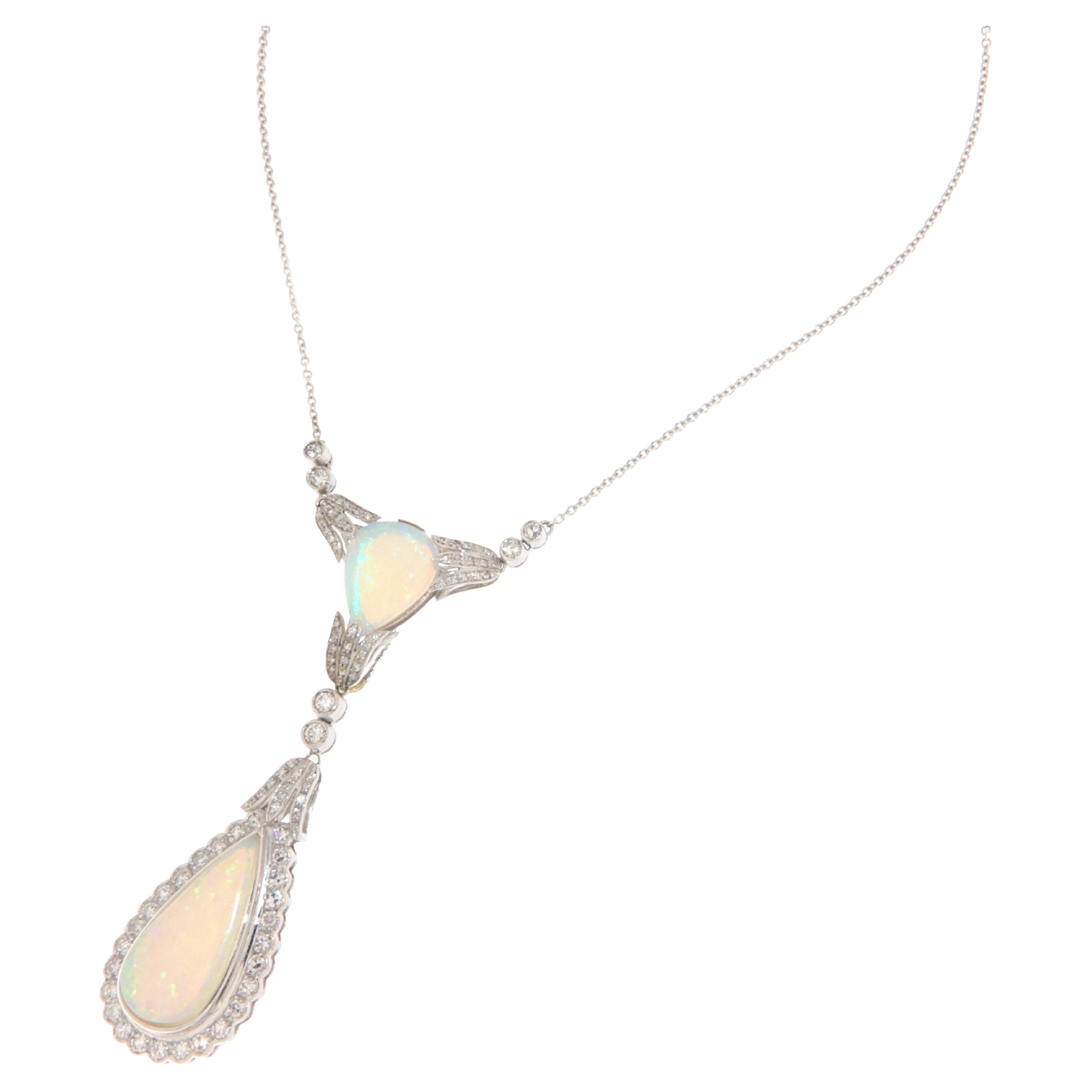 This stunning necklace is an exquisite example of masterful craftsmanship, bringing together the luxurious allure of 18-karat white gold with the mesmerizing beauty of Australian opals and the timeless sparkle of diamonds. Designed to captivate and