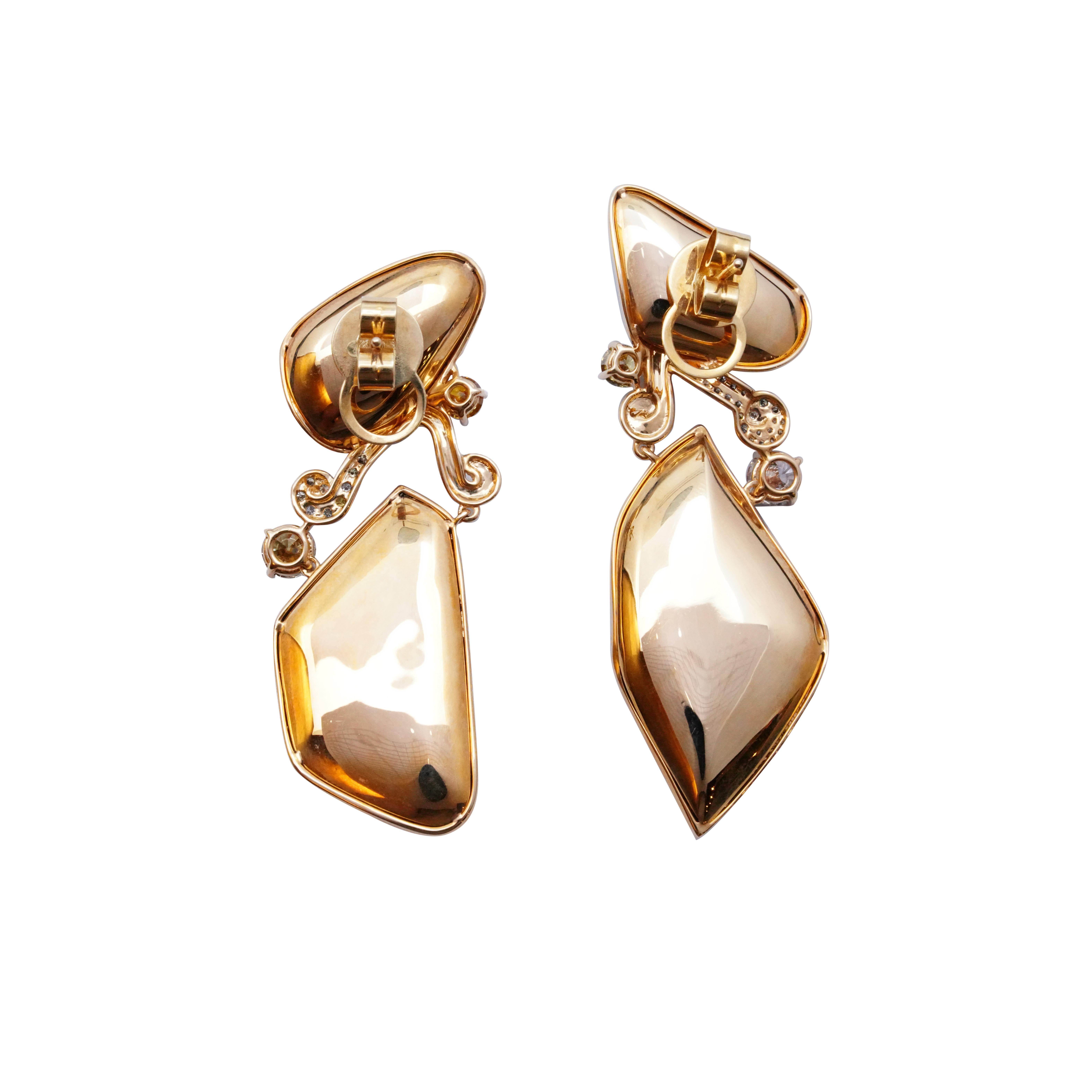 Introducing the captivating Golden Níðhöggr Earrings from 'The Rainbow Prism Collection' by Austy Lee. These earrings are a true testament to the fusion of artistry and elegance.

The Australian Semi-black Opals take center stage, their iridescence