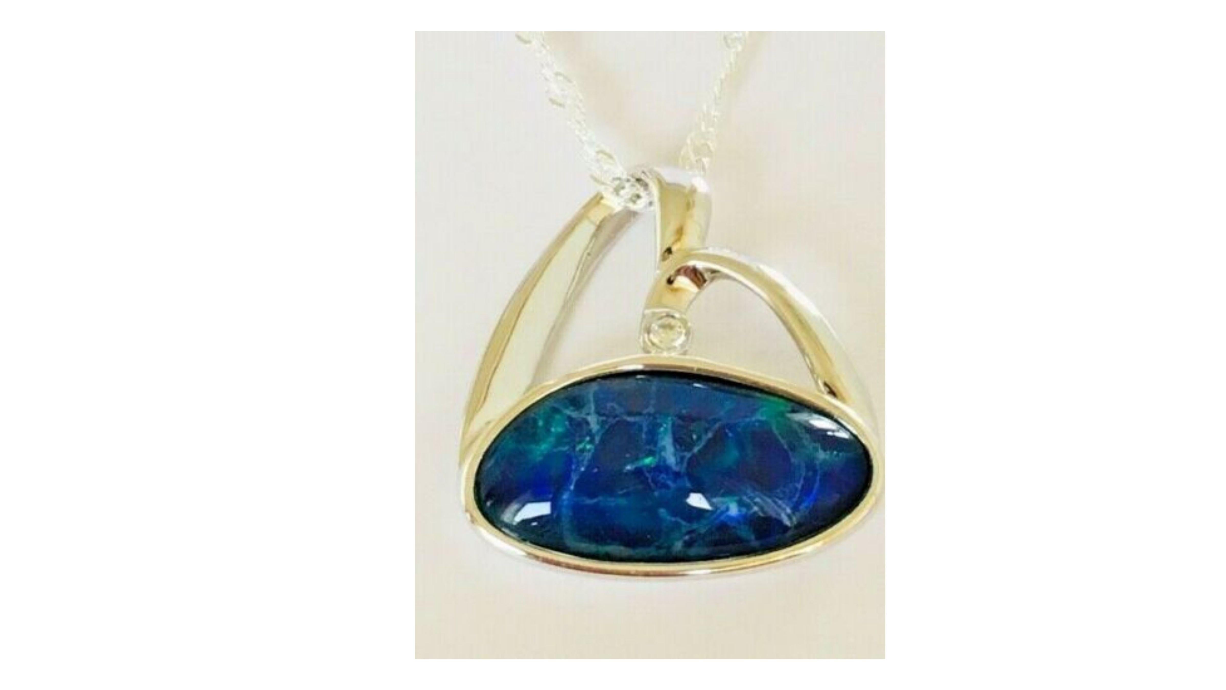

This Australian Opal  Necklace Shows off Bright colors blues and greens and the accent stone just adds a touch of class.  They are often found in Coober Pedy South Australia .
If you are looking for anything specific let us know too.  The pendant