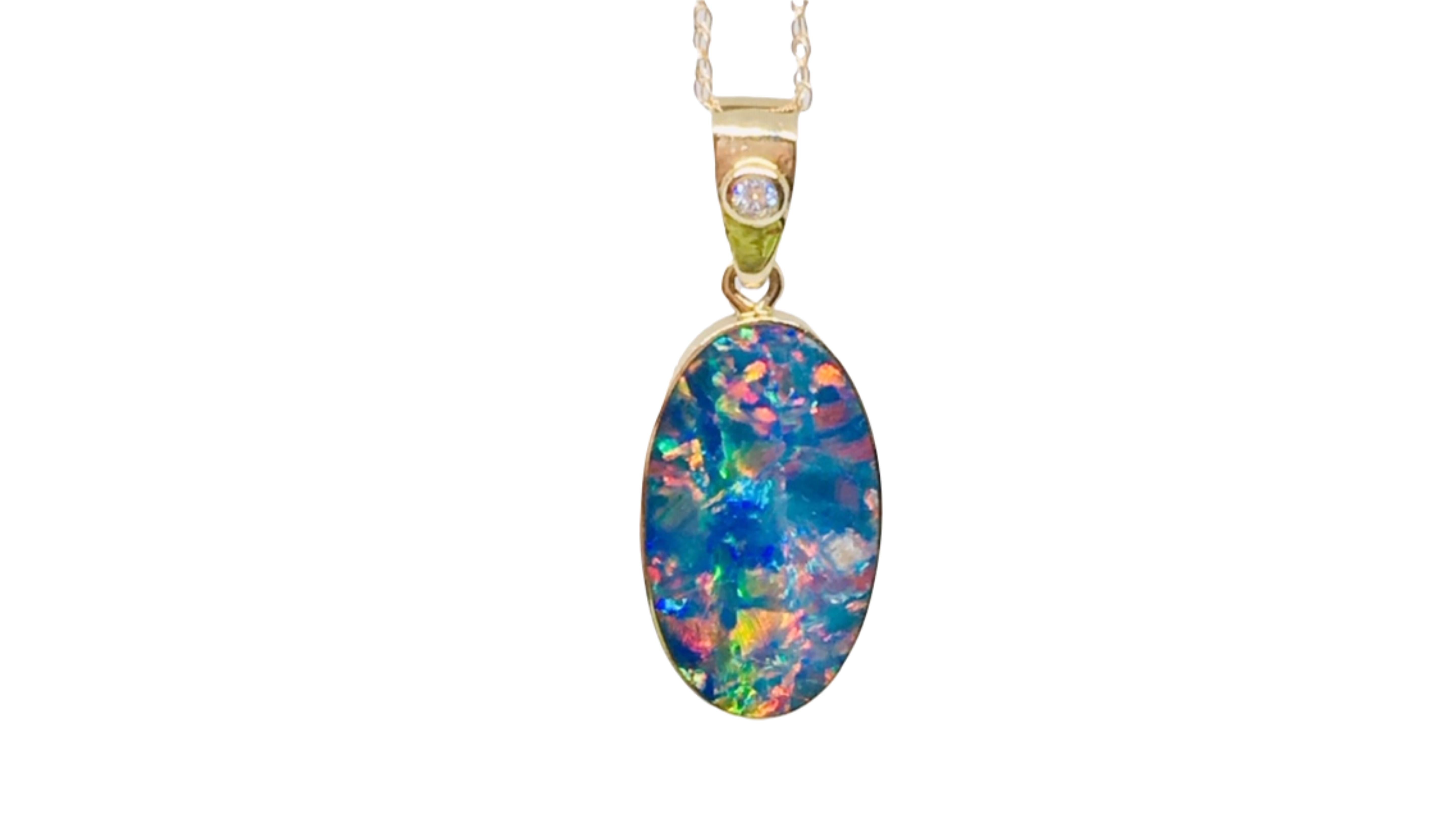 
This is a unique  opal necklace which shows off bright colors yellow blue green orange red and the color red is also very rare to see.  Its from Coober pedy field in Australia    Se the Earrings to match 



 5.85 carats (whole pendant) (around 1.2