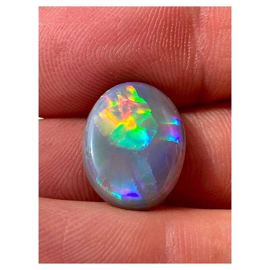 Natürlicher australischer Opal mit blauer, gelber, violetter und rosa Opaleszenz
opal original - Australien
Abmessungen des Opals - 0,12 х 0,47 х 0,67 in / 5 x 14 x 19 mm
Gewicht des Steins - 6,53 Karat