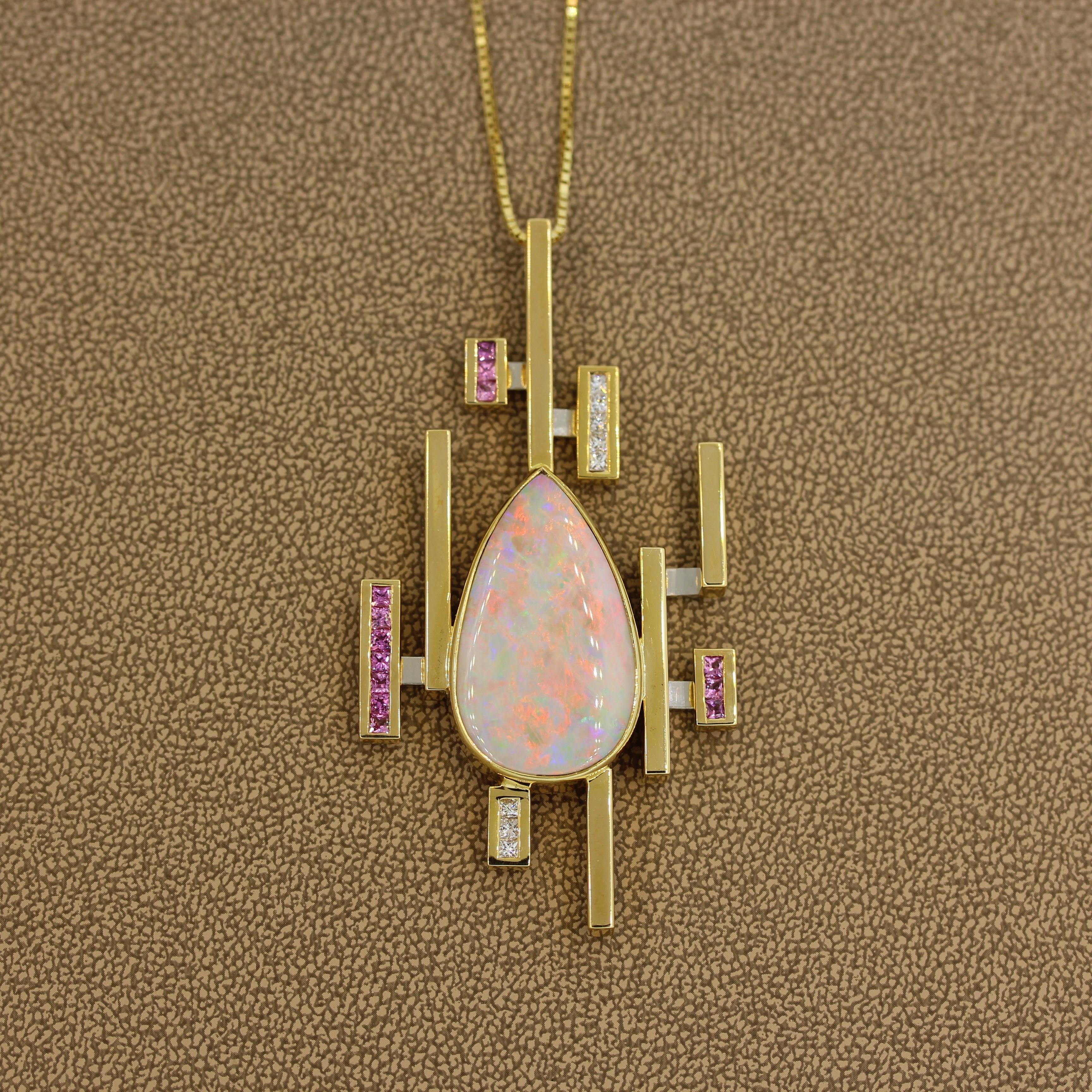 This futuristic pendant features a 30 carat Australian opal bezel set in the center of this pendant. The luscious Australian opal is accented by 0.51 carats of princess cut pink sapphires and 0.34 carats of diamonds channel set in vertically linear
