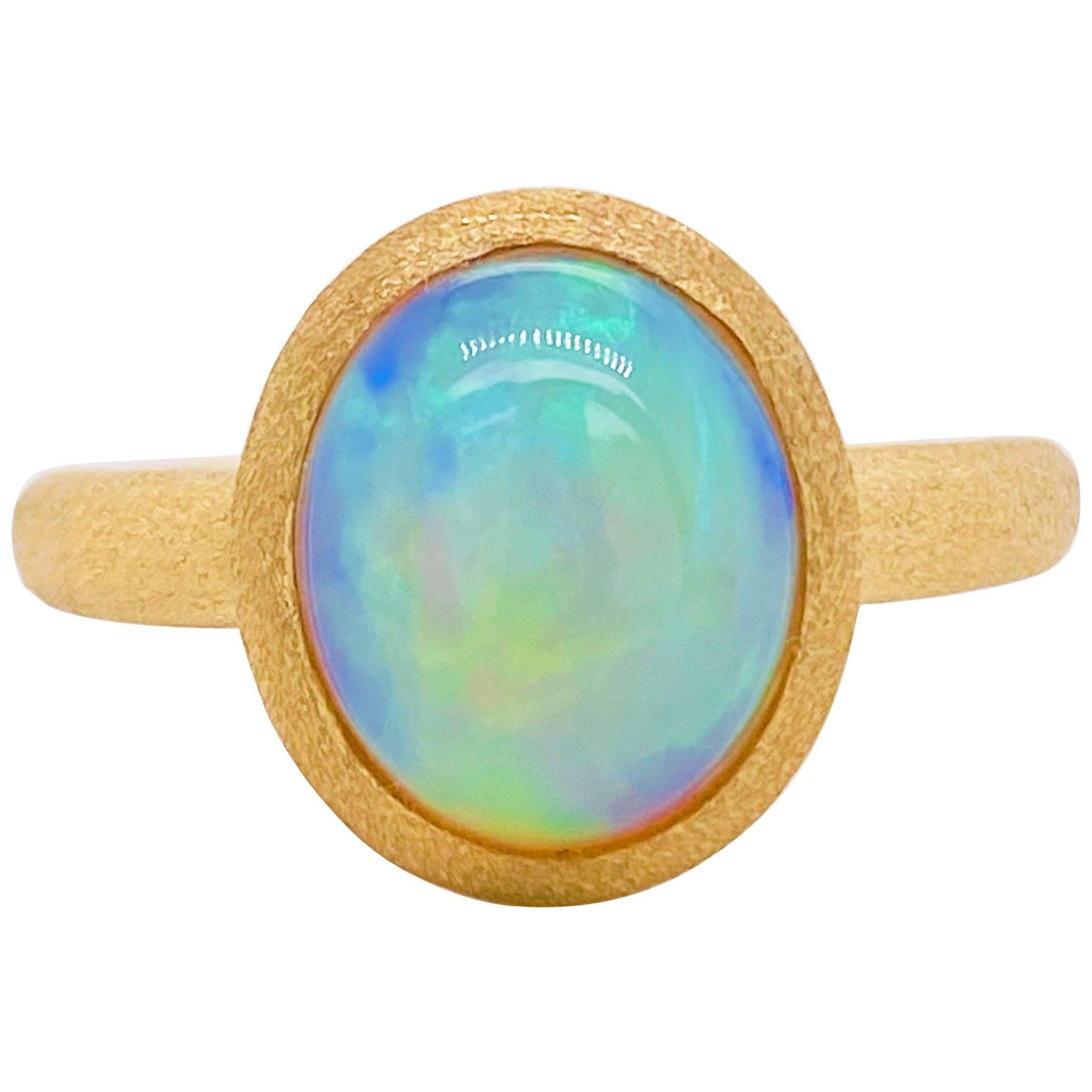 For Sale:  Australian Opal 2.29cts, Brush Finish 18K Yellow Gold, Oval Bezel Solitaire Ring