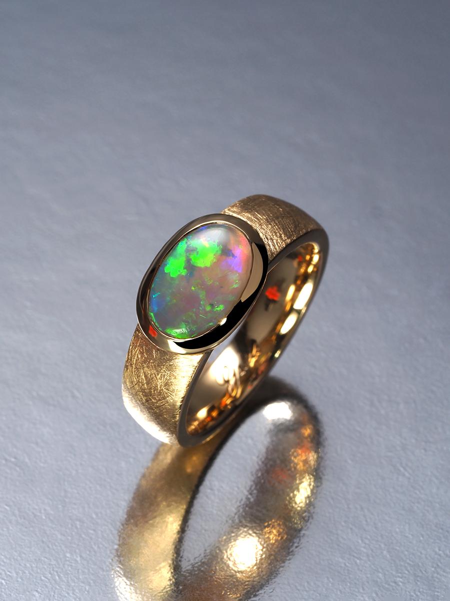 Australian precious Opal 18K Yellow Gold Ring 
opal origin - Australia
opal measurements - 0.28 x 0.40 in / 7 х 10 mm
stone weight -  1.5 carats
ring size - 7 US
ring weight - 9.23 grams


We ship our jewelry worldwide – for our customers it is free