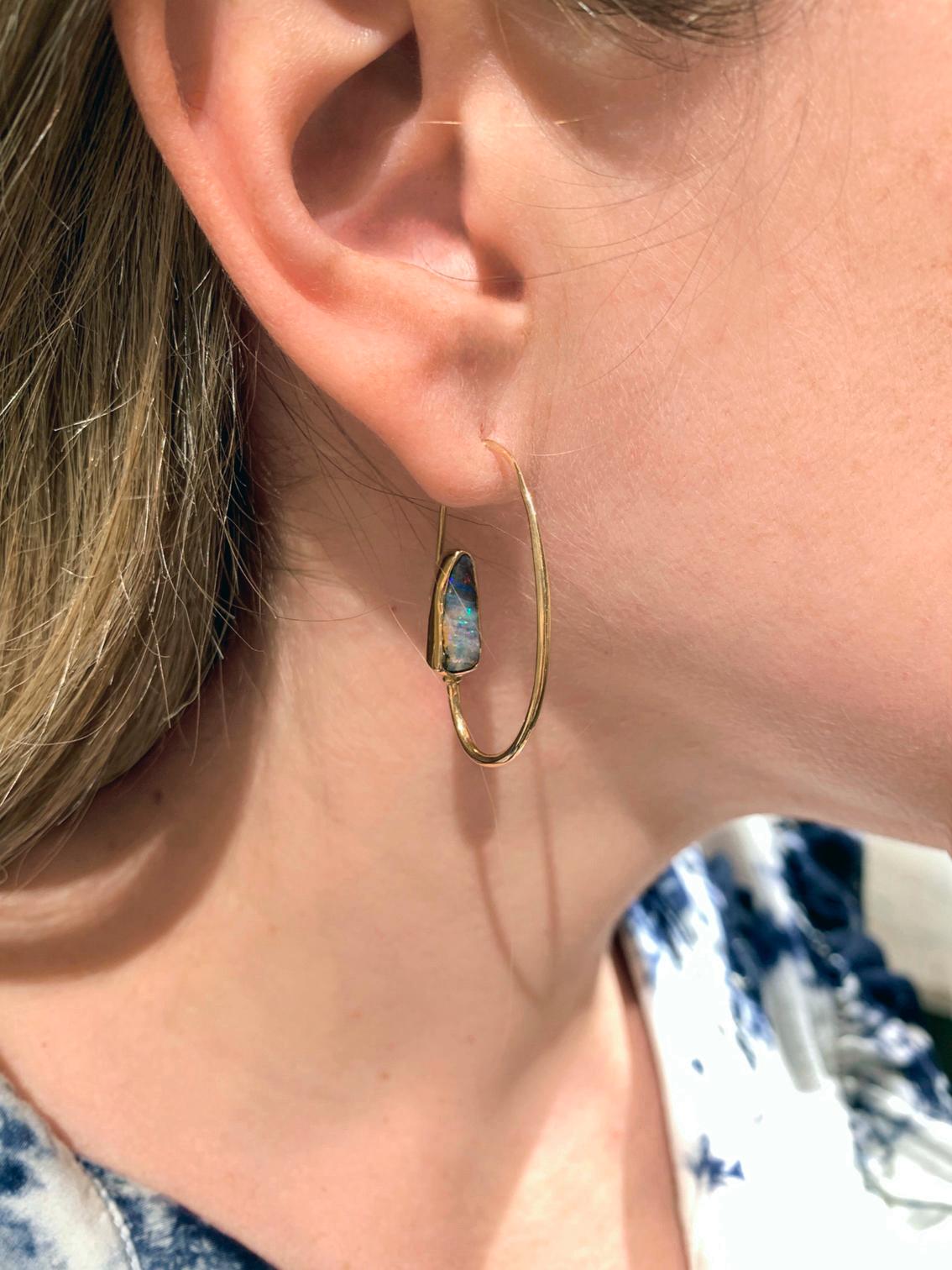 One of a Kind Opal Back Hoop Earrings by jewelry designer Julie Romanenko featuring a pair of beautiful elongated and curved natural Australian opals bezel -set in high-polished 14k yellow gold with a unique front-to-back design.


About the Maker -