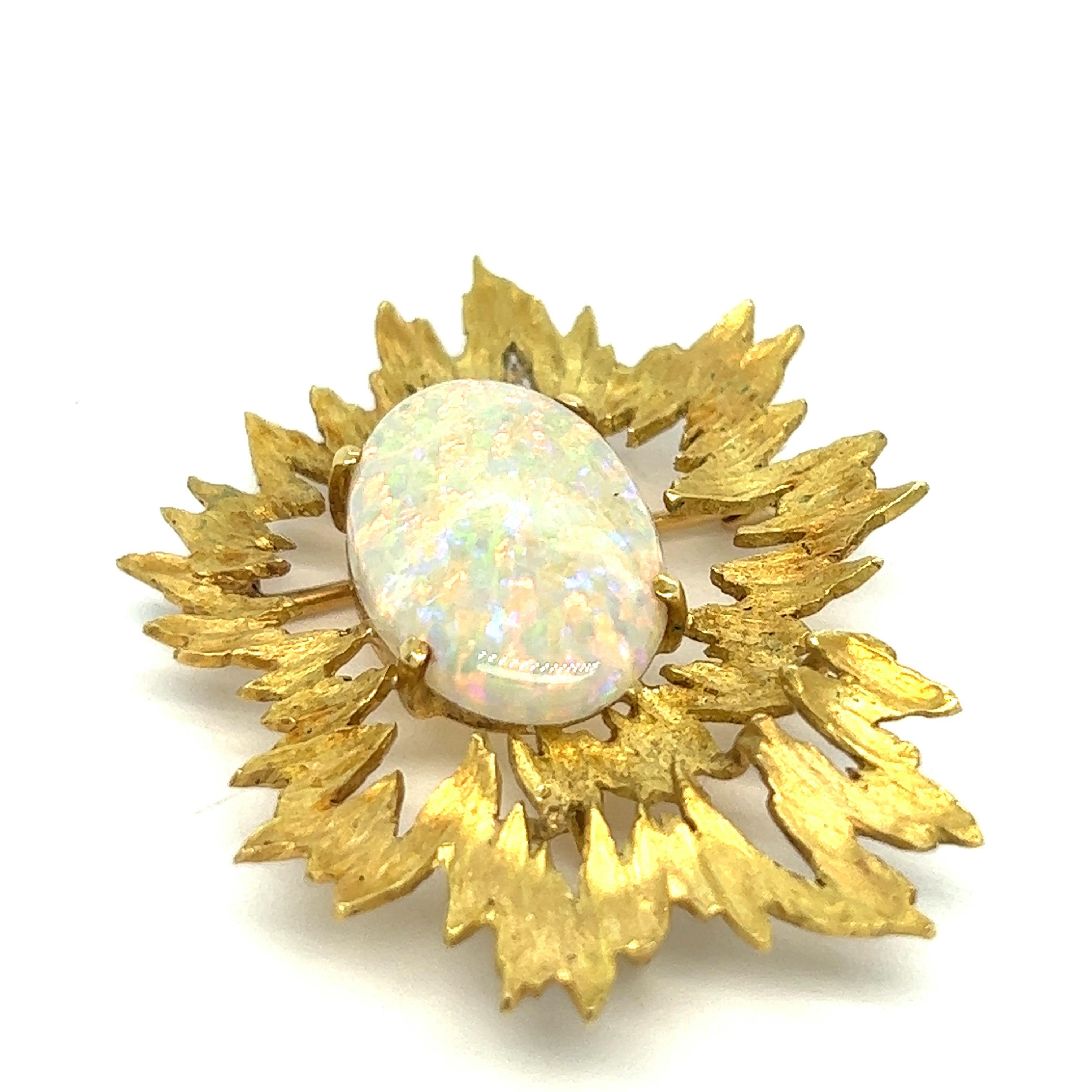 Australian opal yellow gold pendant brooch

Opal measures approximately 13 x 19.5 mm, 18 karat yellow gold; marked 18k

Size: width 1.5 inches, length 1.75 inches
Total weight: 10.6 grams