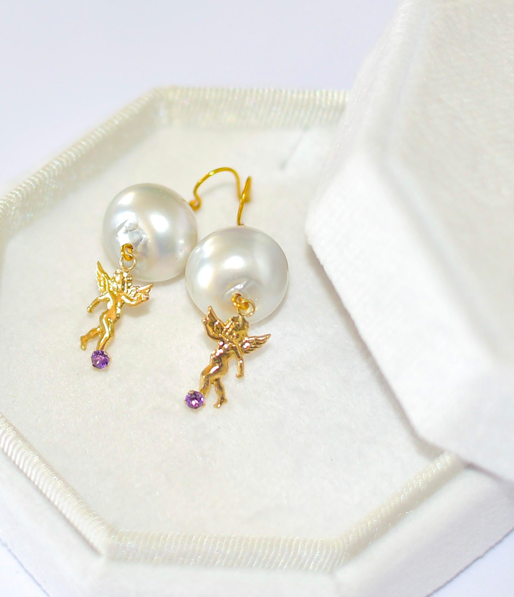 Australian Paspaley Cultured Pearl (14mm) with lovely 14K Solid Yellow Gold Angel with Amethyst. Absolutely stunning and lovely earrings for a special Lady, who loves meaningful jewelry, 
Earwire is 14K Solid Yellow Gold
Length 1.5 inches

Before