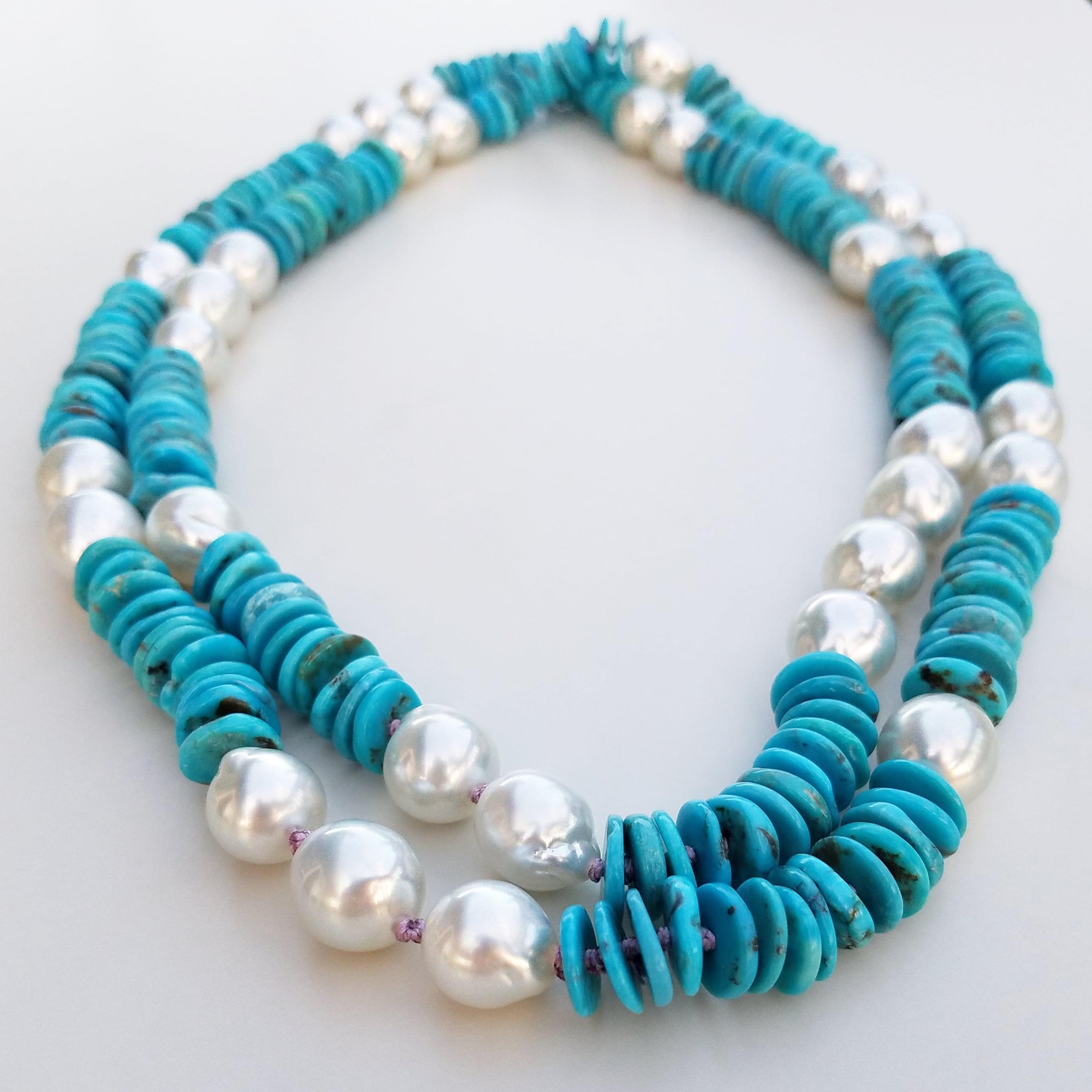 31 South Sea Australian Pearls ranging from 12.5mm to 13mm in size are paired with Natural Nacozari Turquoise Discs, all hand knotted by the artist on Lavender color silk. With an approximate total length of 43 inches or 109 cm, this necklace may be