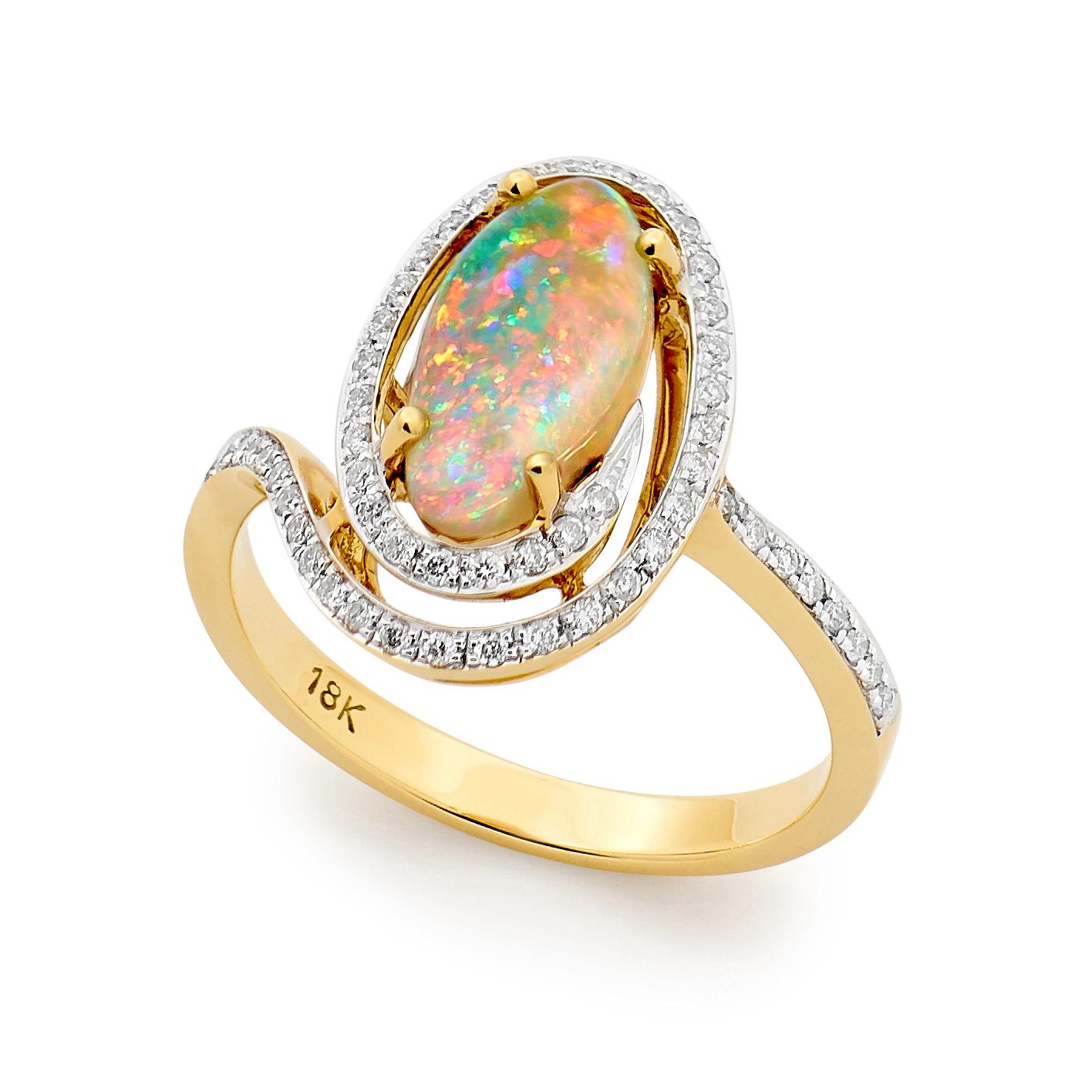 The centrepiece of our “Santa Barbara” opal ring is a 1.57 carat natural light opal from our own mines in Jundah-Opalville. Set in 18K yellow gold and circled by a sparkly swirl of 56 diamonds, this jewellery piece is reminiscent of coastal cities