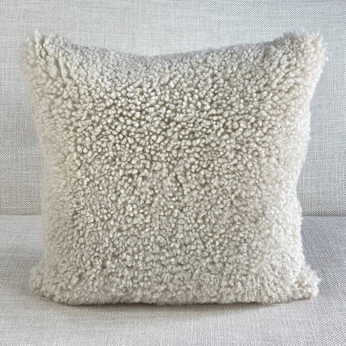 Add layers of natural textures to your living room or bedroom decor with this captivating shearling sheepskin pillow. Its tight curly wool pile translates stylish comfort and expresses natural signature living.
This Australian made pillow is