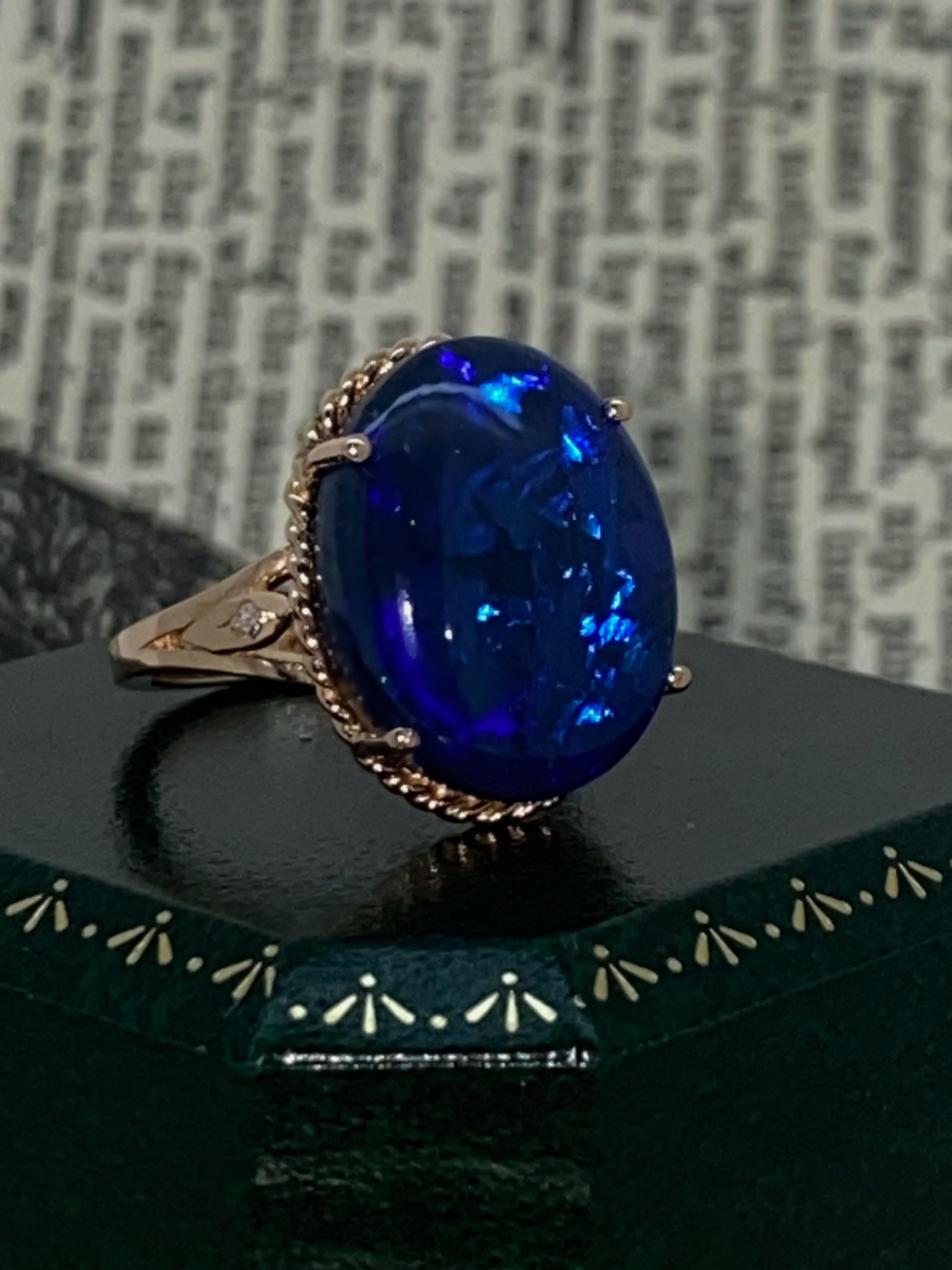 Featuring one of the most desirable gems:
Australian Solid Natural Black Opal 
this piece of jewelry is a head turner & 
very important addition to your collection...

~~~

Performed in 18K Rose Gold, 
this cocktail ring is set with a Black Opal 
of